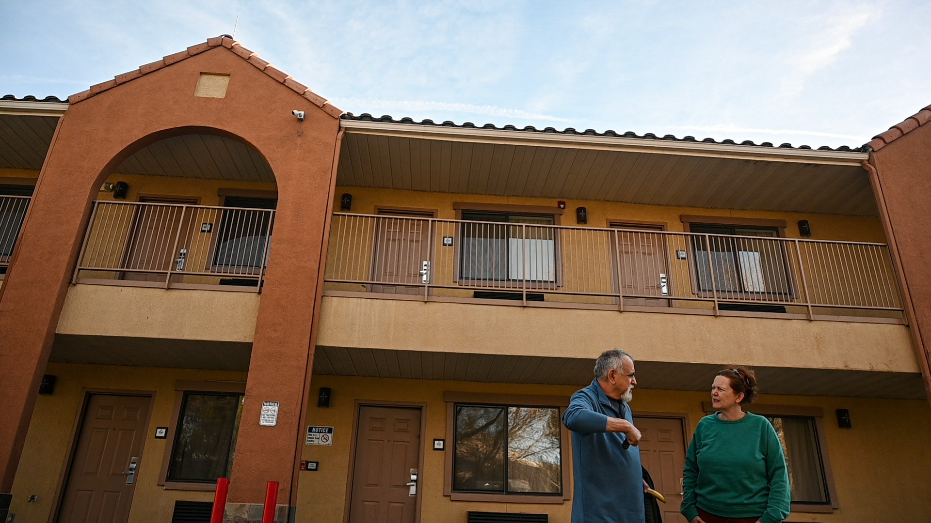 My parents stand in front of the motel we checked into late the night before. Roadtrips mean driving long stretches and stiff, springy beds.