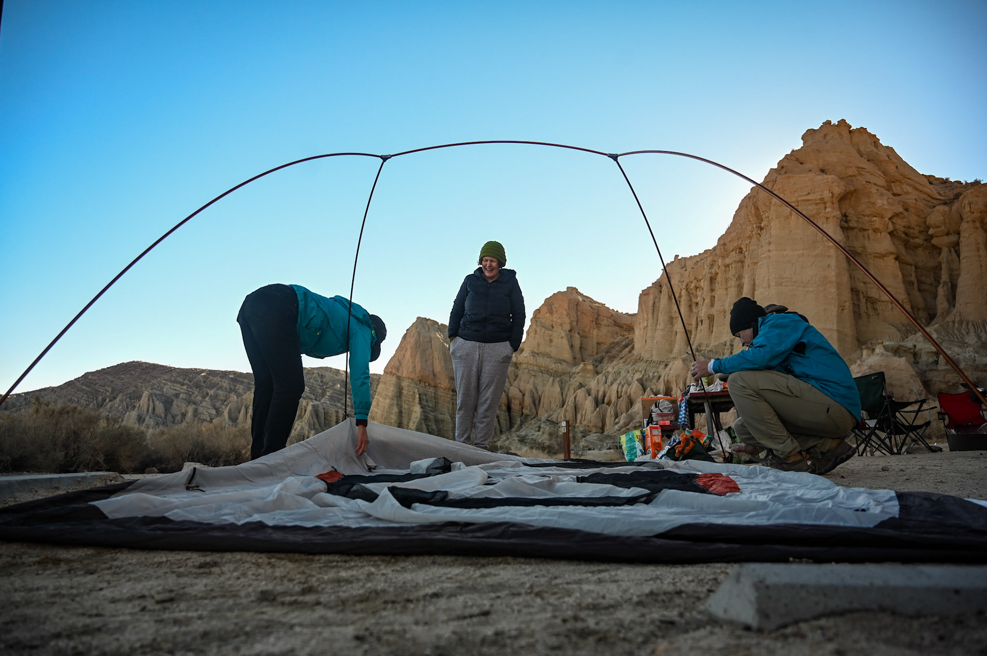 Mom comments on Aunt Katherine's habit of bending at the waist, not the knees. 