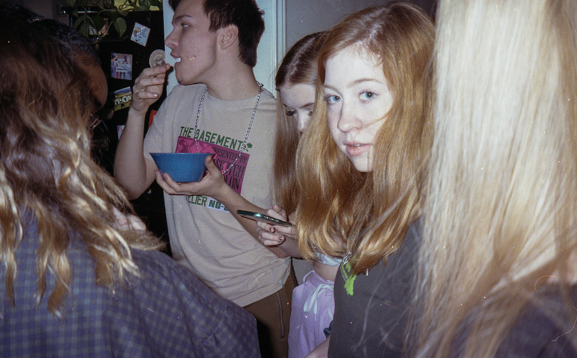 Phoebe catches the camera flash at Celeste's surprise 16th.