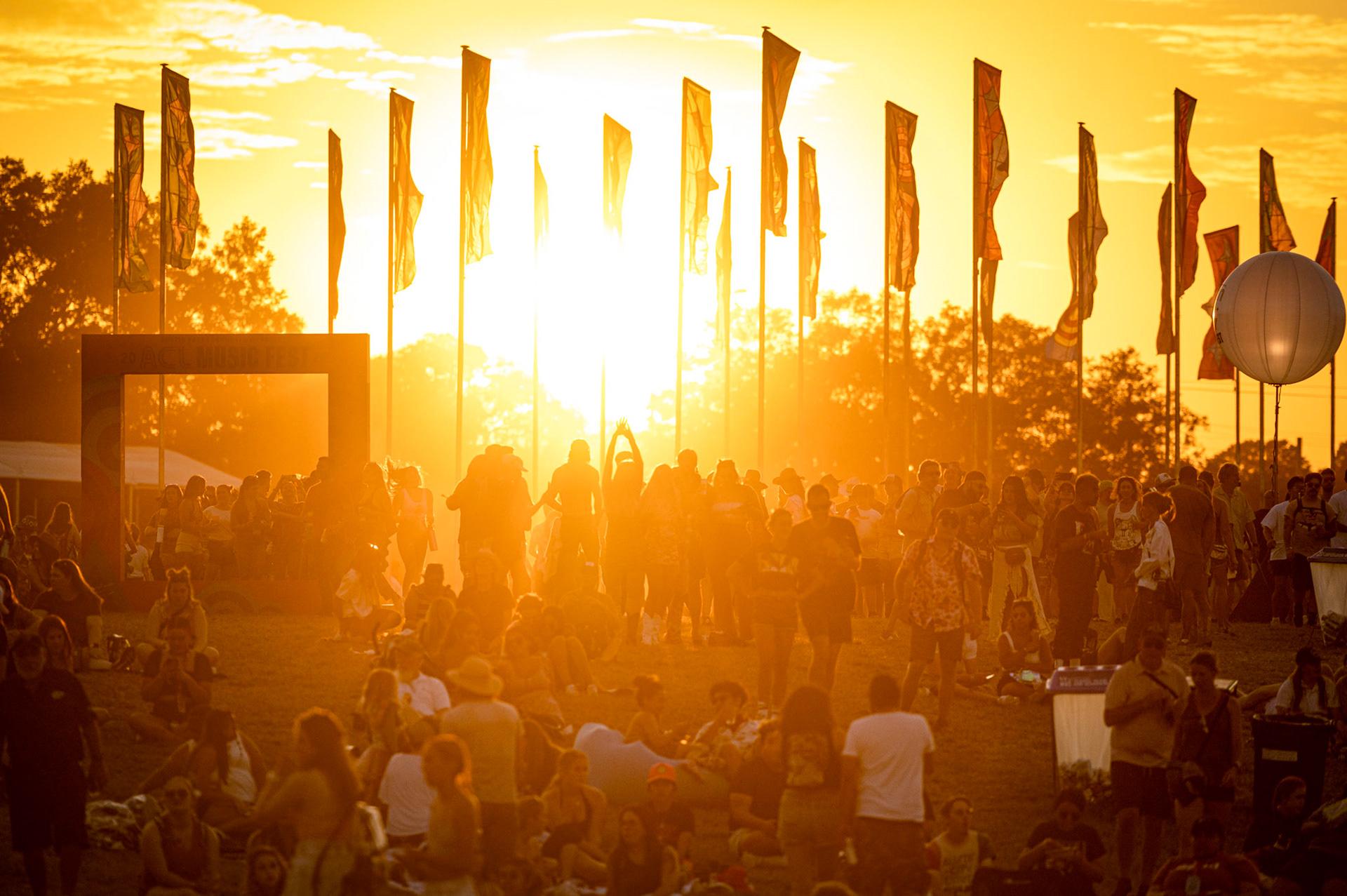 Attendees walk through Zilker Park on the second day of Austin City Limits festival, Oct. 8, 2022. 
