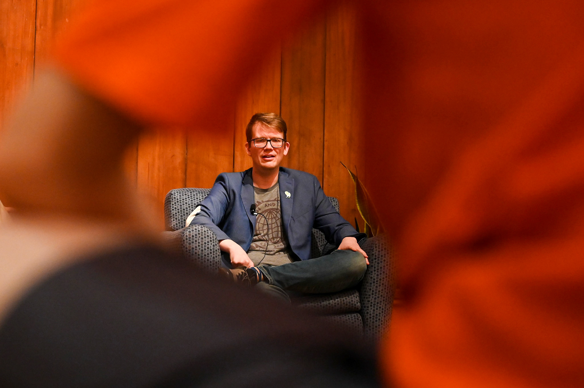 Hank Green answers questions about his education in biochemistry and environmental studies during his conversation for a UT lecture series on Apr. 14, 2022. Green revealed he has plans to remake the biology crash courses with UT chemistry professor Kate Biberdorf.