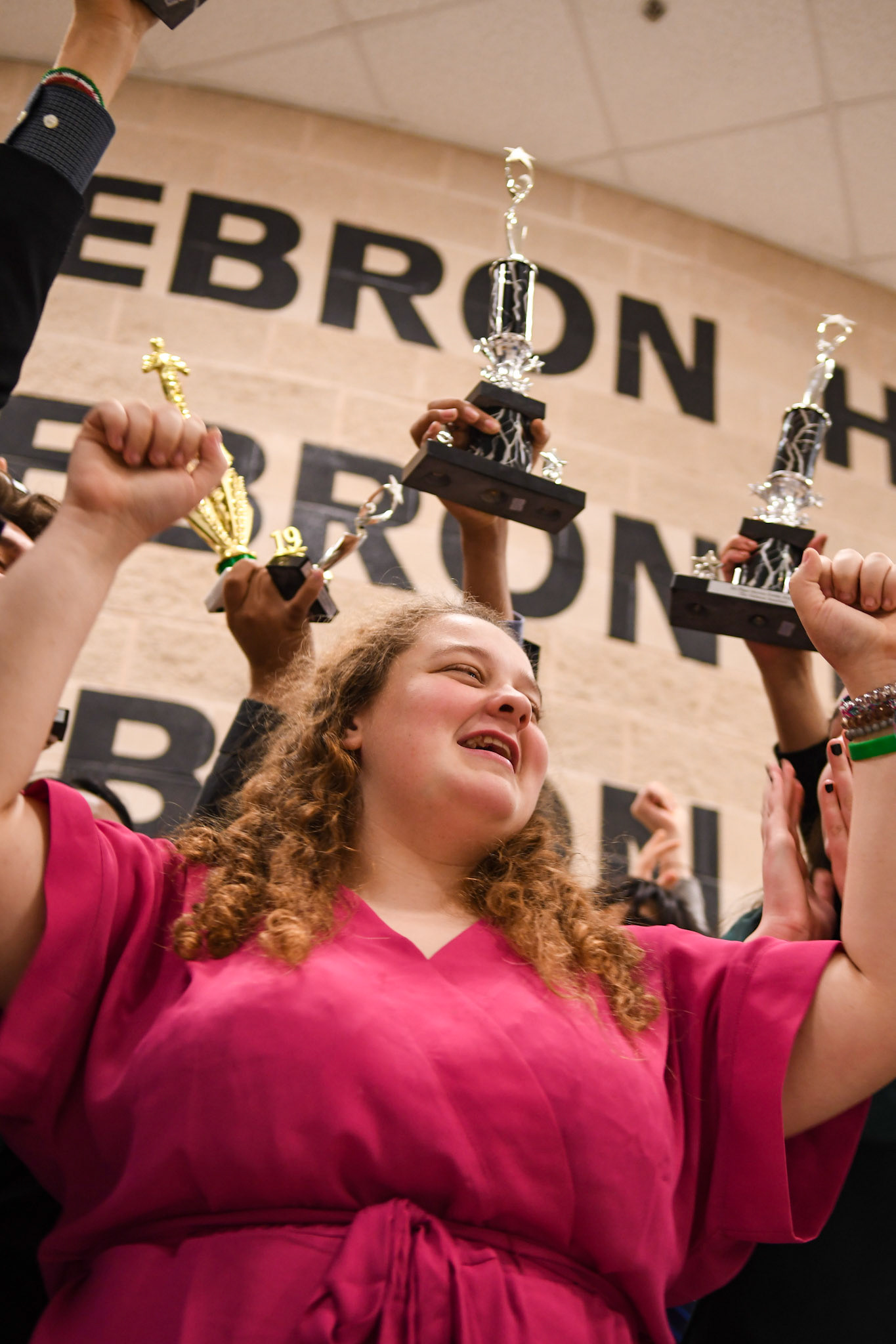 Ashley Chapman cheers with the Richardson High School debate team after the awards ceremony on Nov. 2, 2019. 
