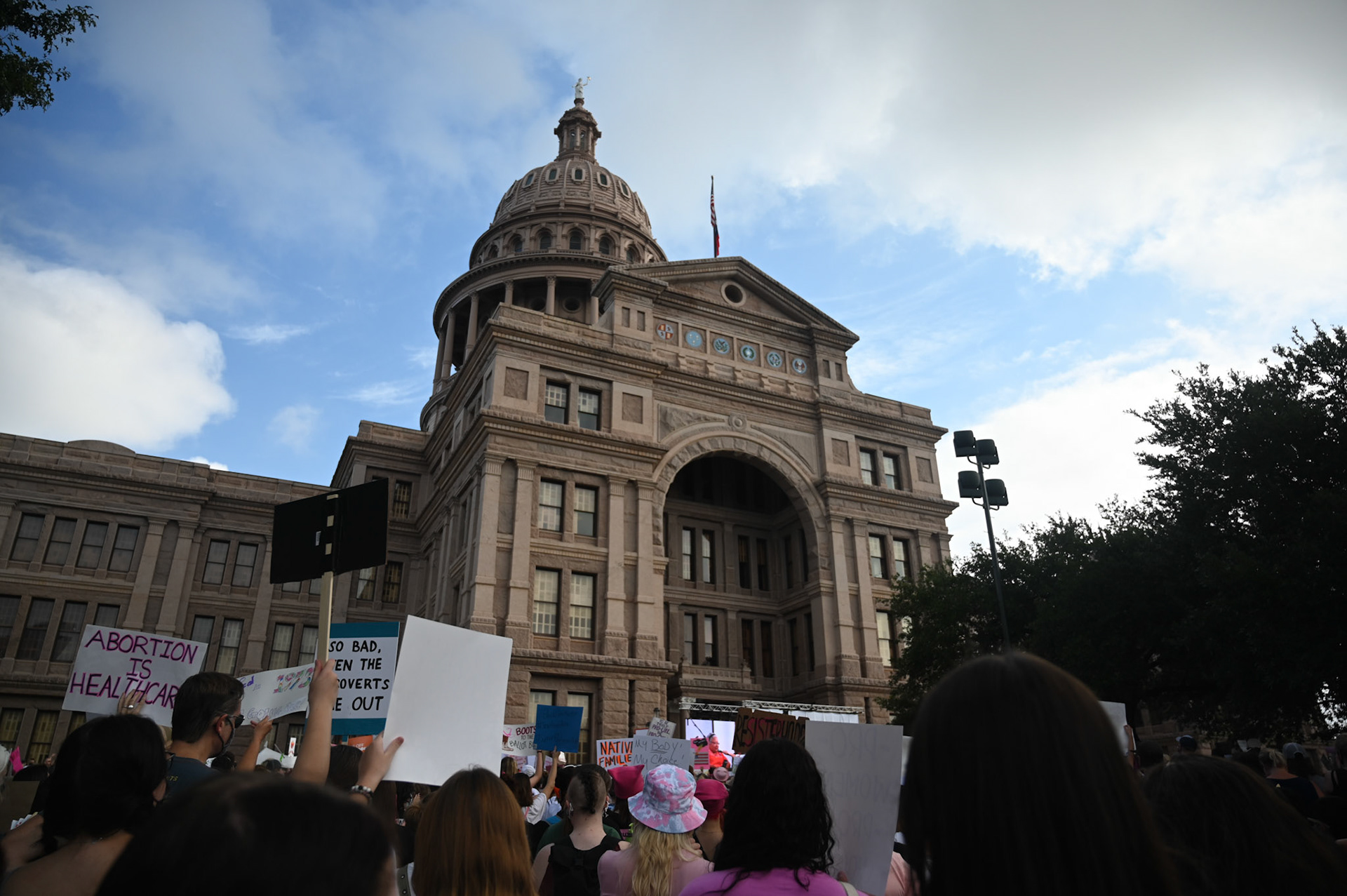 Protestors surround the Texas Capitol steps at the Austin Women's March on October 2, 2021. Wendy Davis, a former Texas state senator and founder of Deeds Not Words, a women’s rights organization, described the march with one word: resilience. “It’s your future,” Davis said. “This is the future of young women, of our young trans and non-binary community. Without your voices and your participation, you will likely inherit something that isn’t going to give you the opportunities that you deserve.”