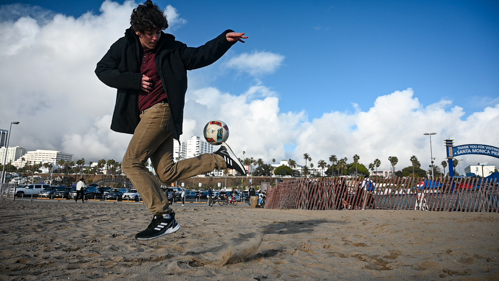 Ali shows off his skills. The ball takes the 1,435 mile trek with us, too, because soccer on the beach is Christmas tradition. 