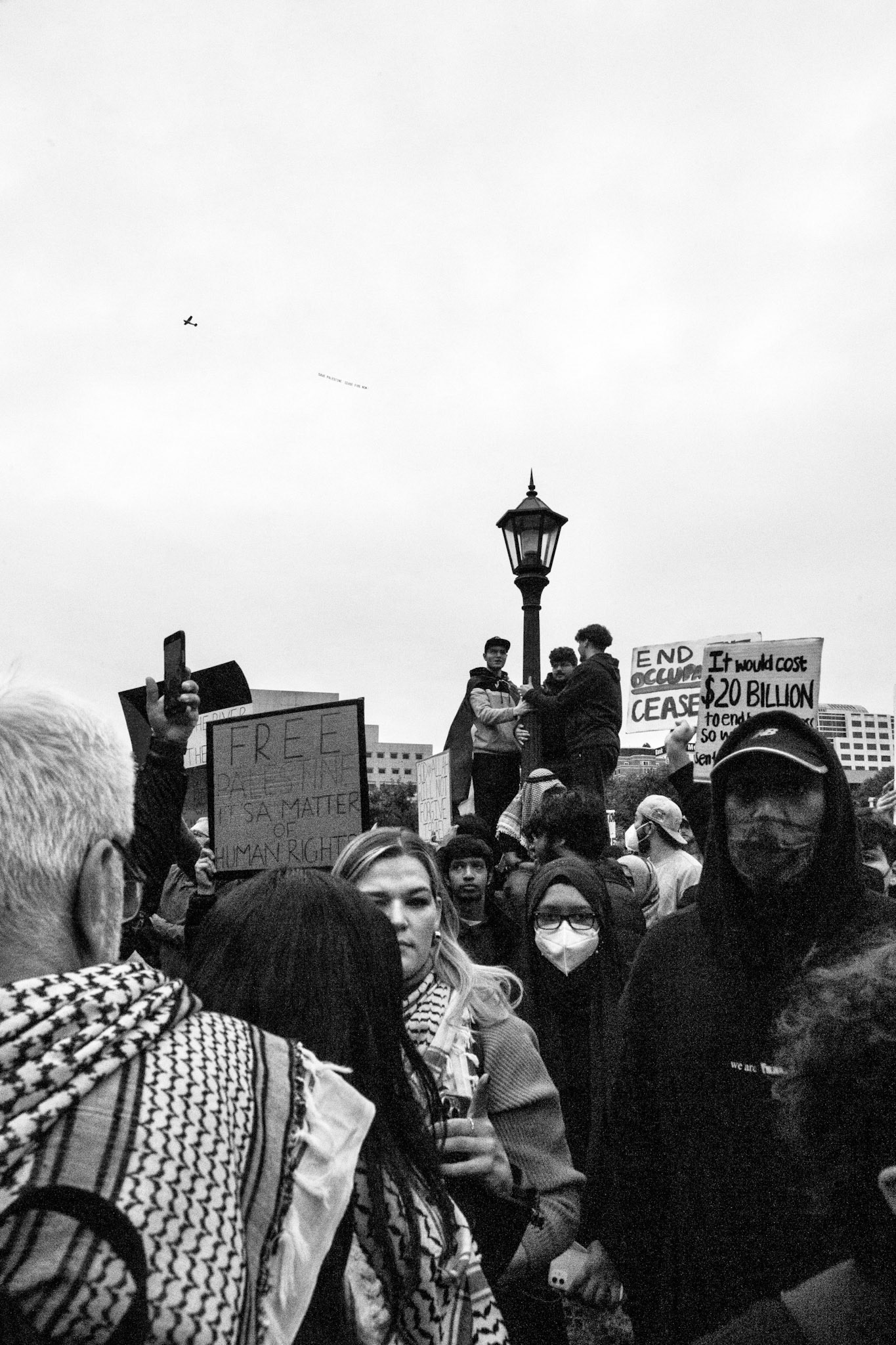 Protestors weave their way across crowded sidewalks on the Capitol grounds during the mass demonstration.