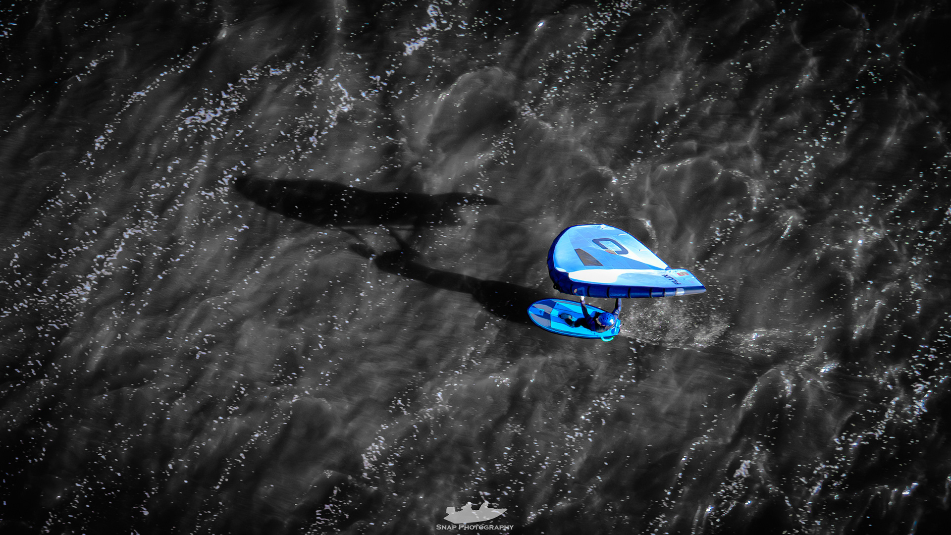Wing foiling across Christchurch harbour 