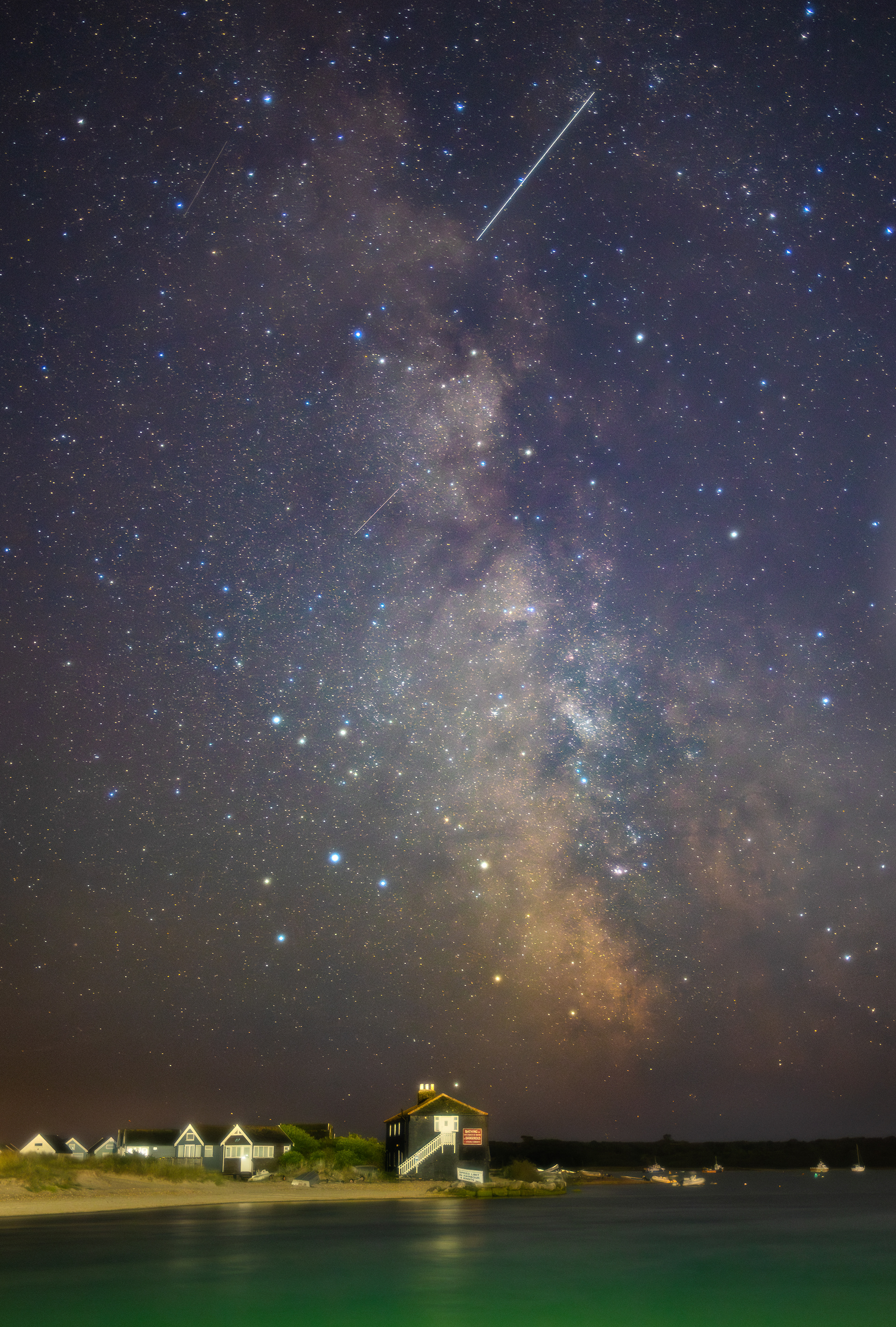 Milky way over the beach huts
