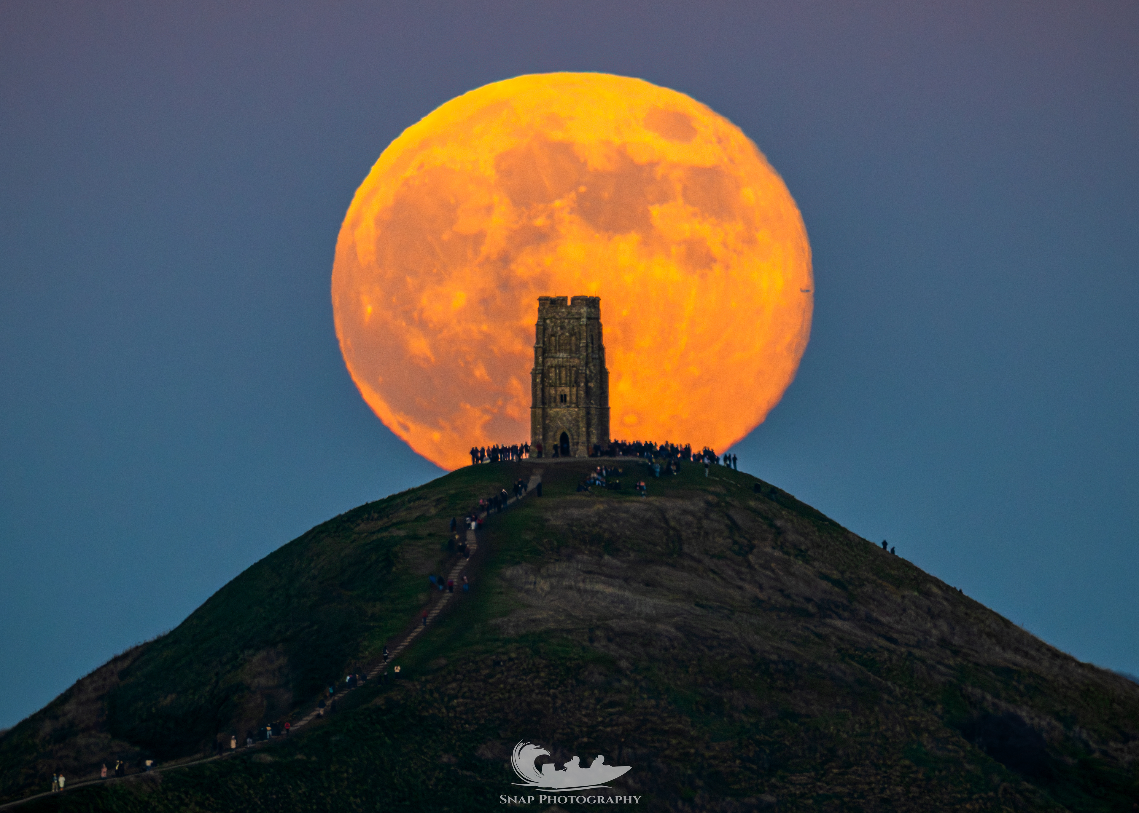 The full Wolf moon rising over Glastonbury tor