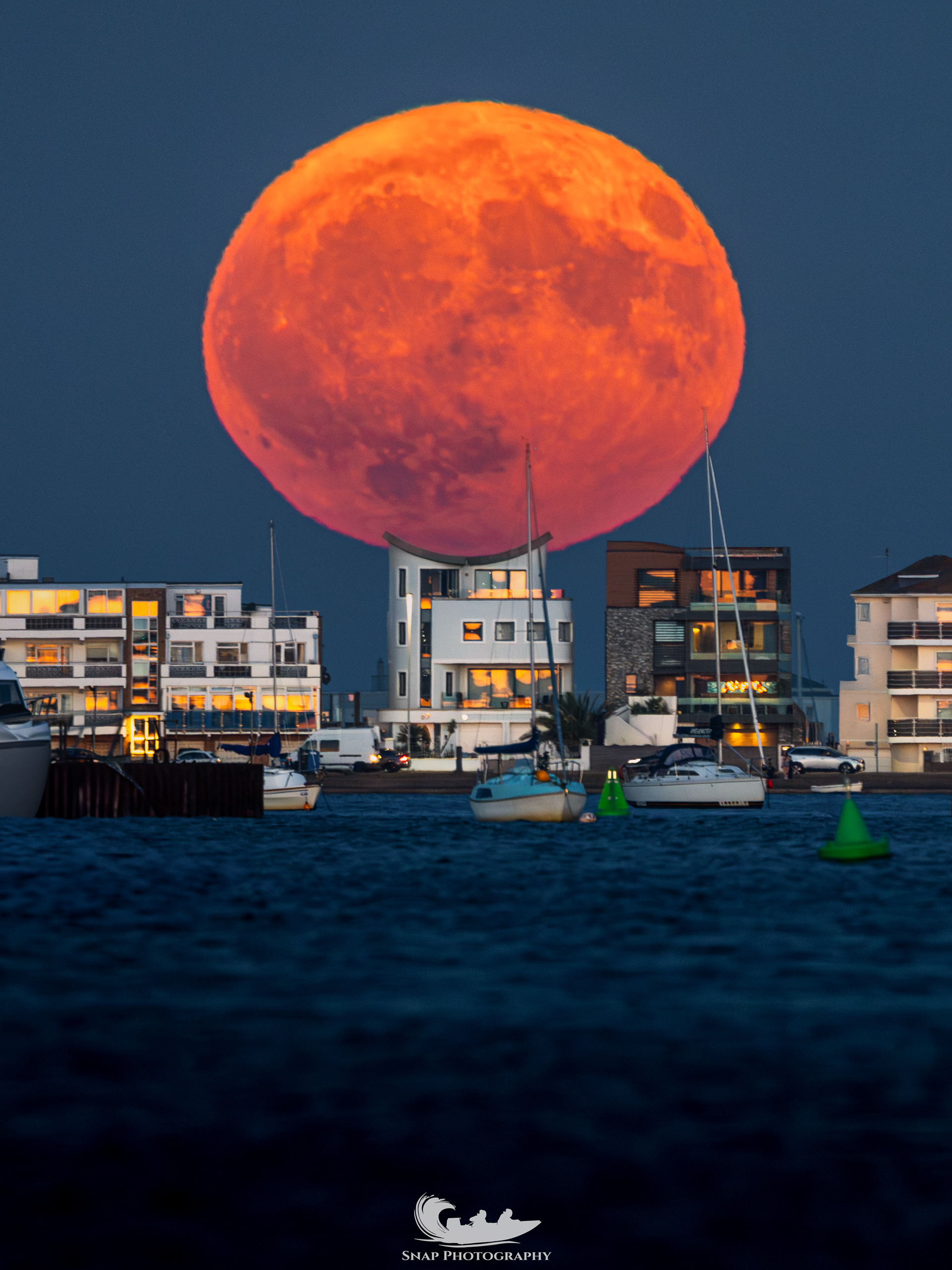 Buck moon rising over Sandbanks