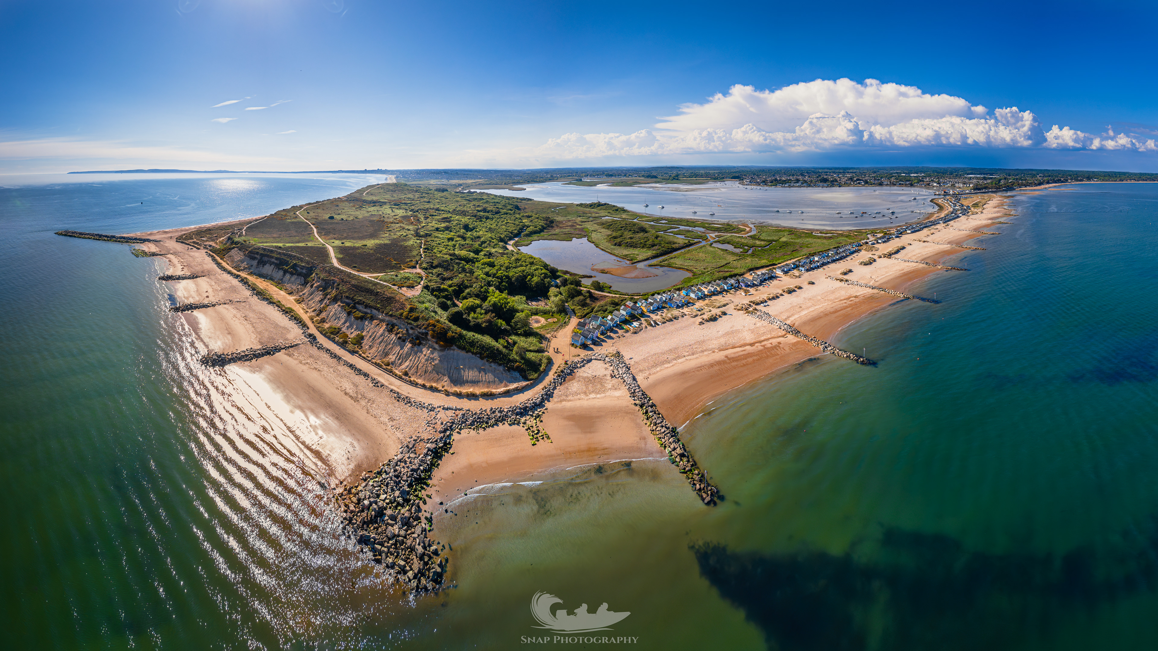 Hengistbury Head with some storm clouds further in land