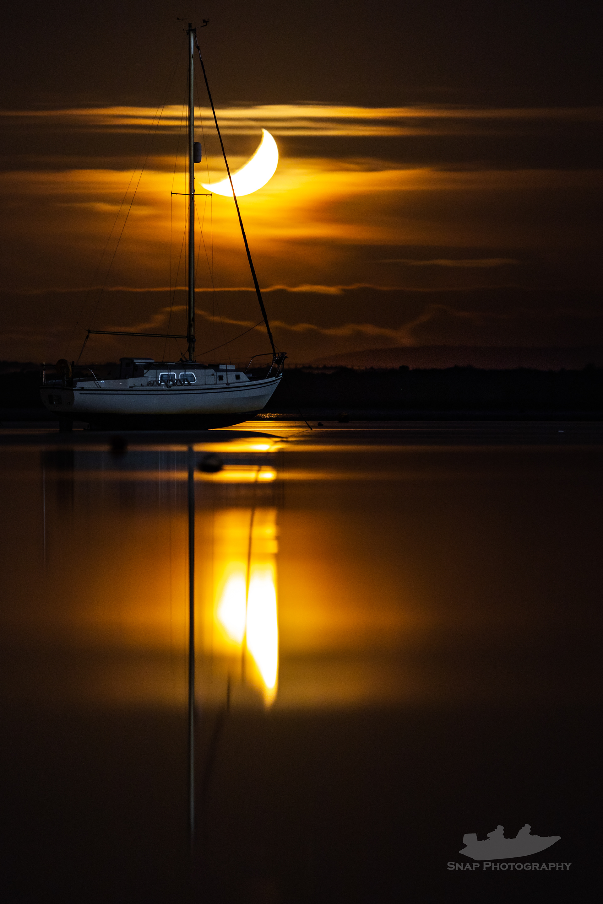 Moonset over Christchurch harbour