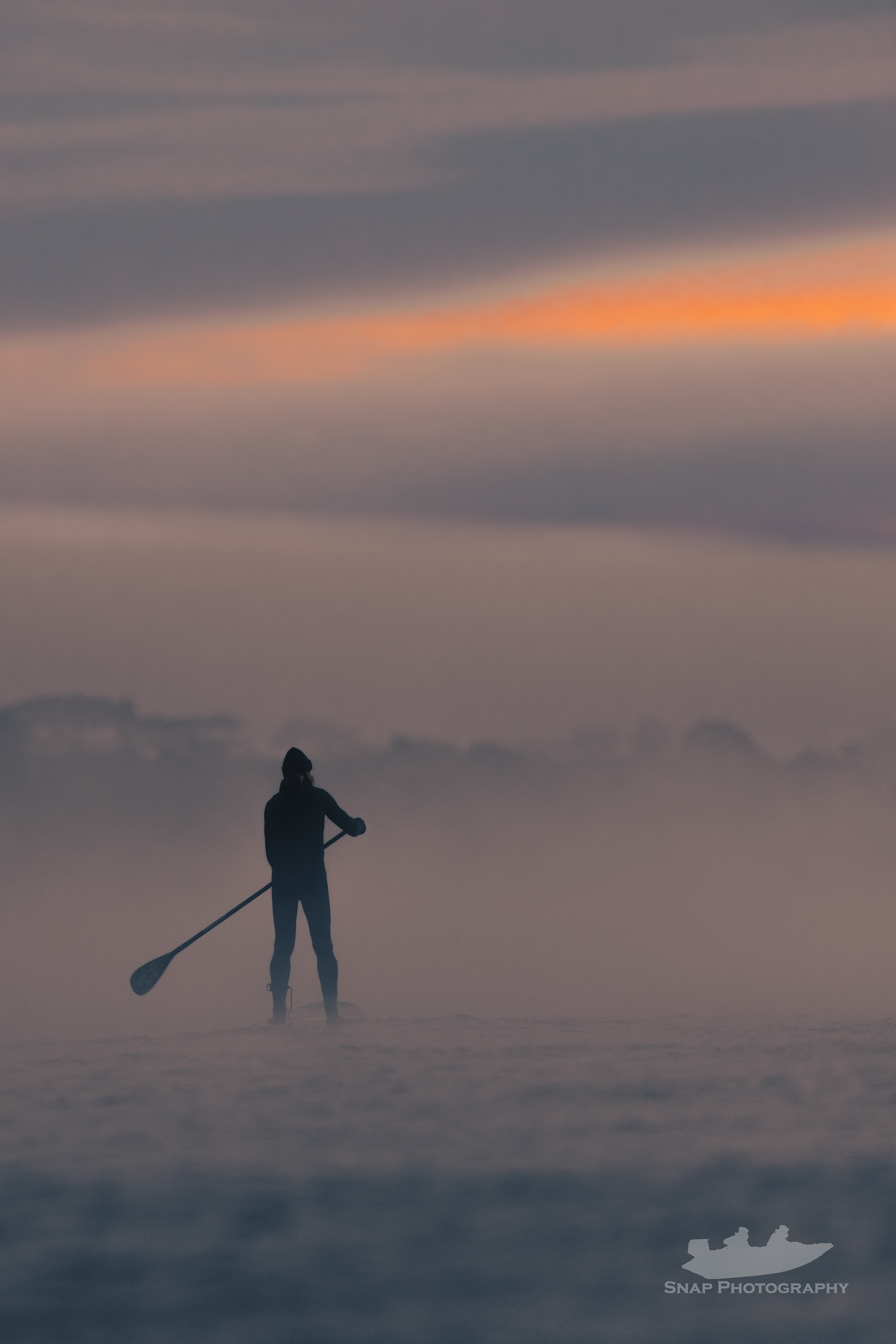 Paddleboarding in the mist. 