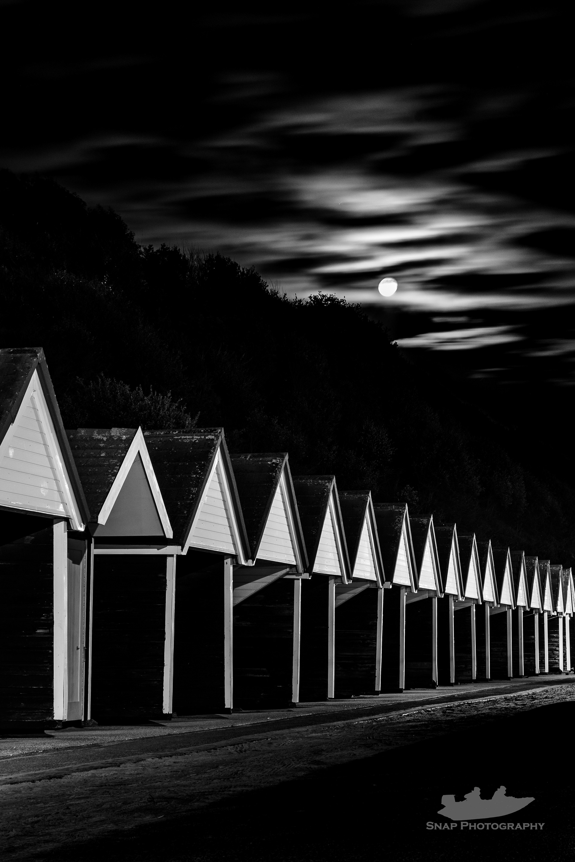 Bournemouth prom under a full moon rising 