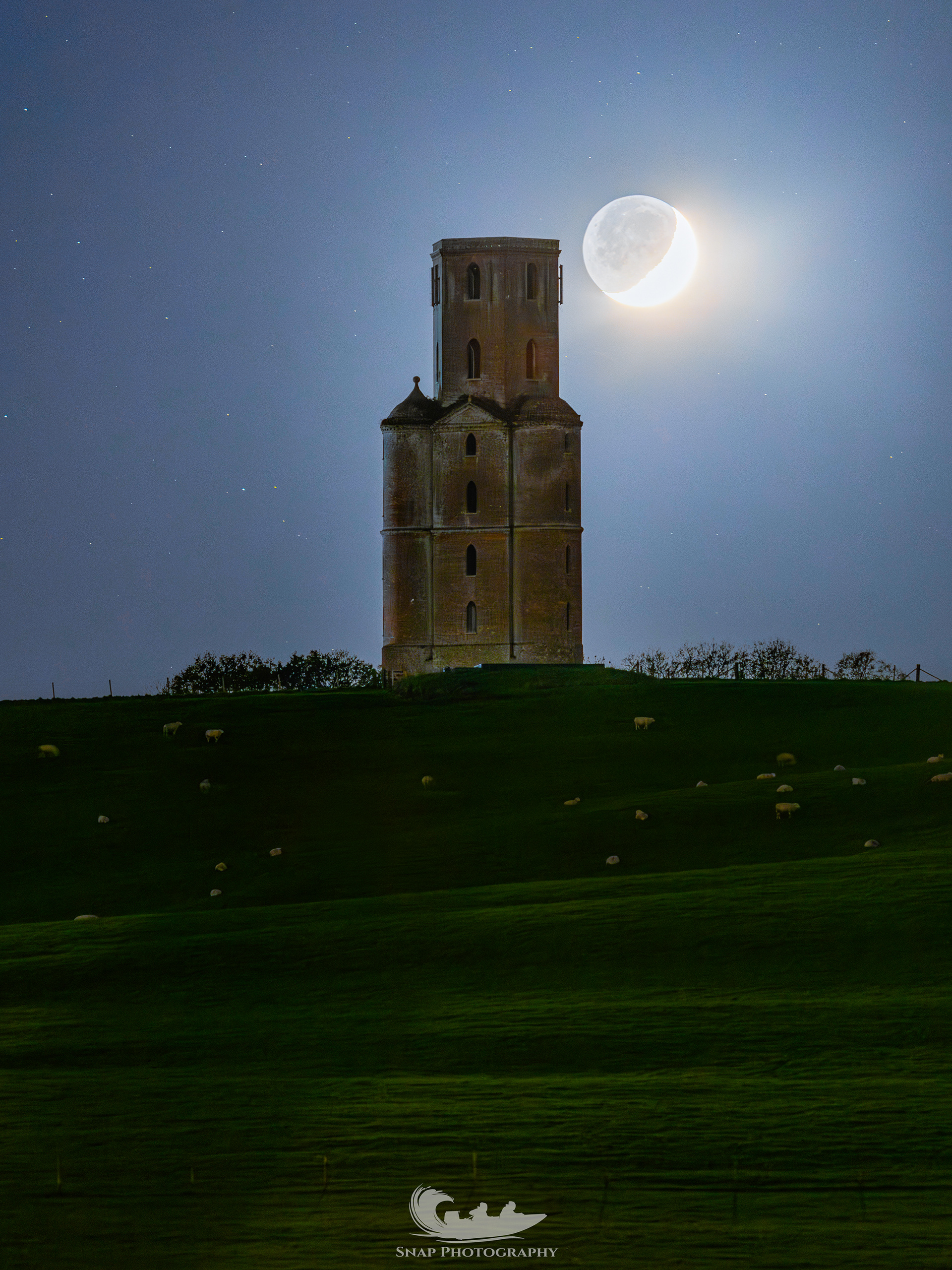 Crescent moon setting behind Horton tower