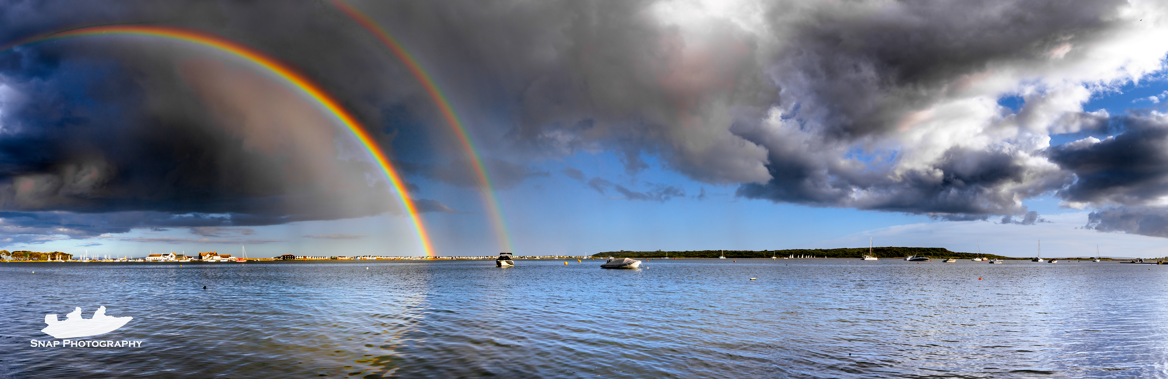 A huge double rainbow across Mudeford quay and sandbank 