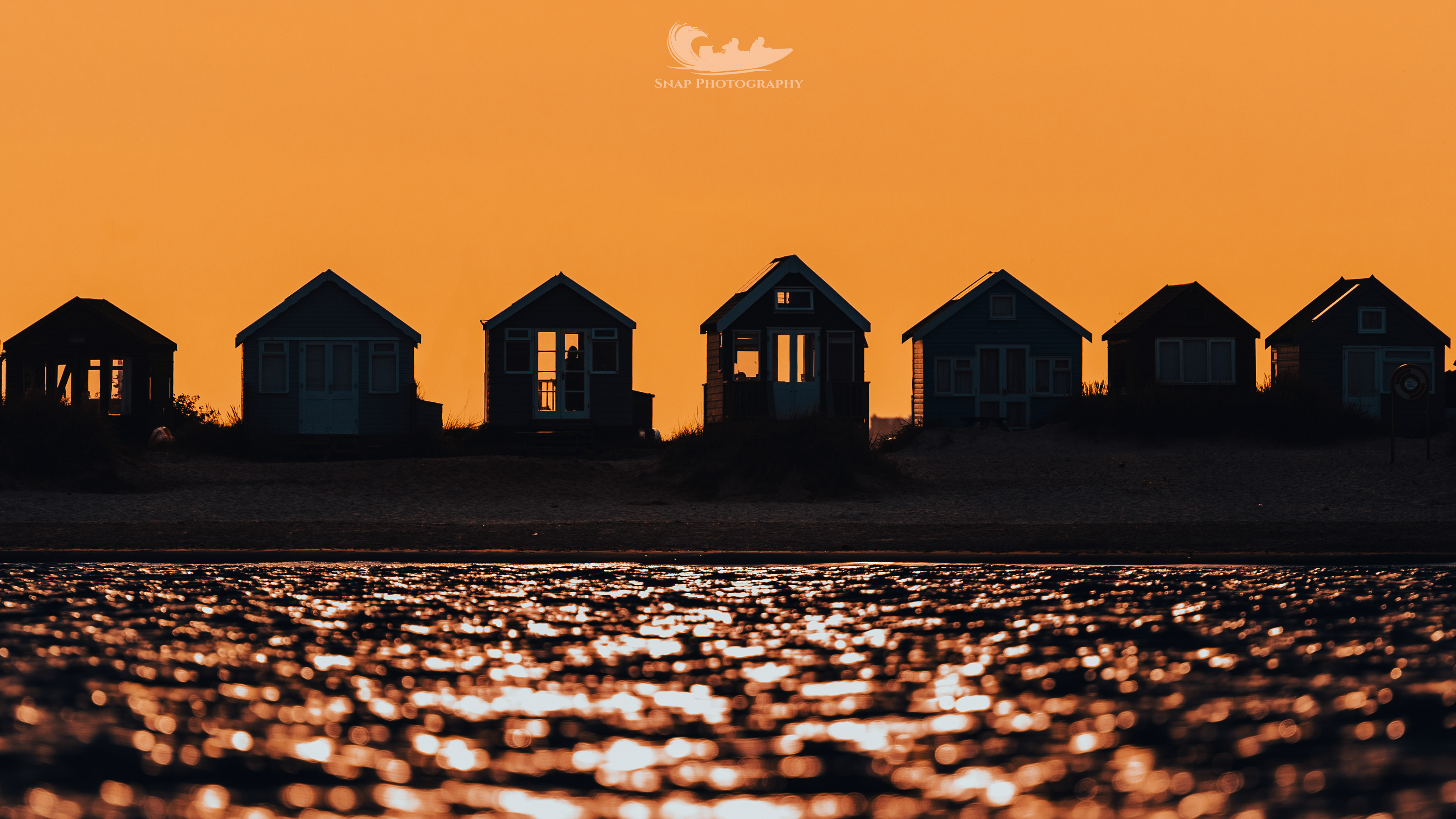 Beach hut sunset