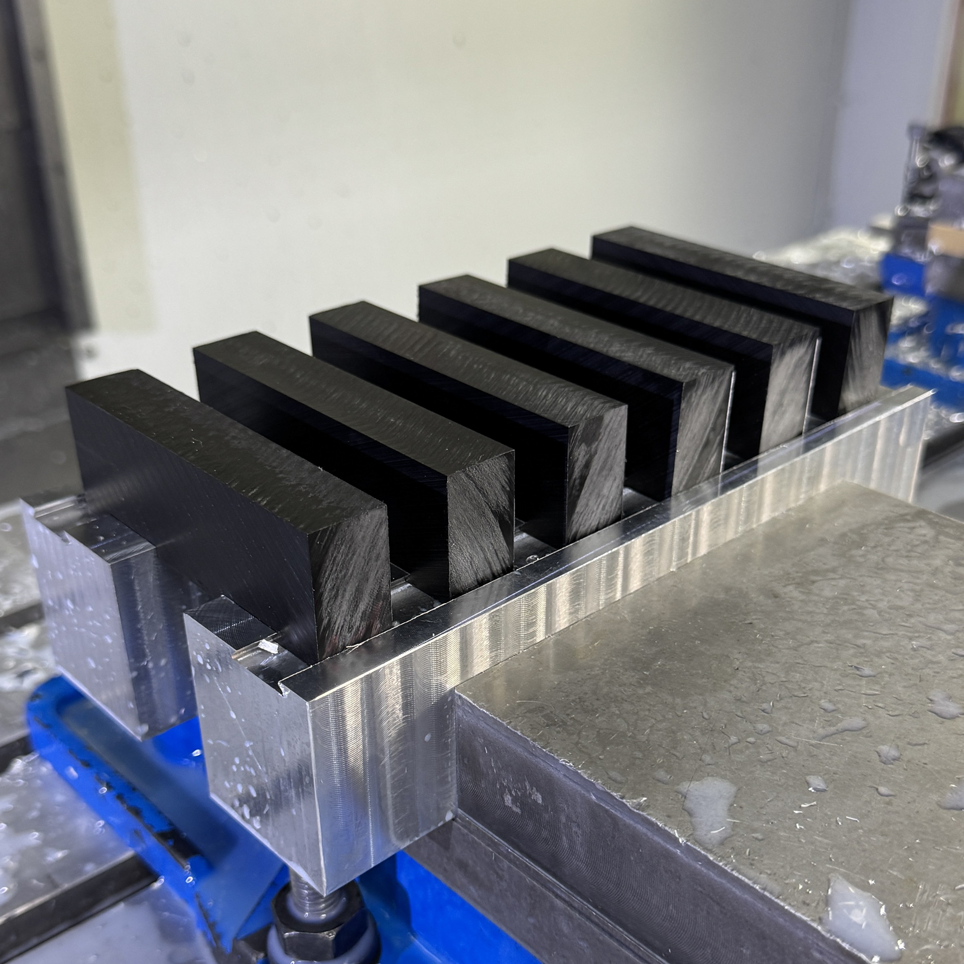 Reduced setup time by creating a custom 6 piece fixture and program