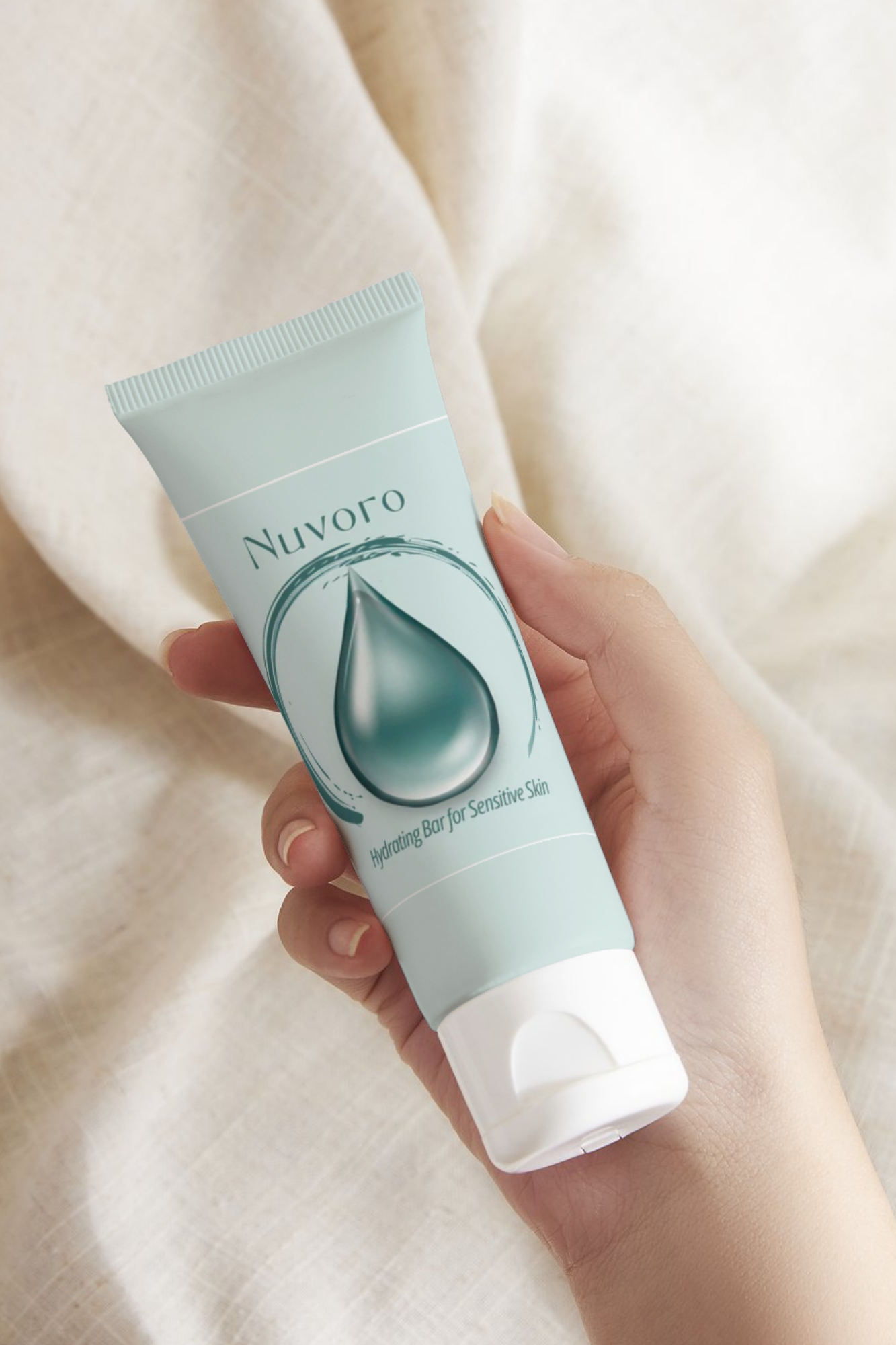 Hydration visualized. The NUVORO mark turns a single water droplet into a brand promise for sensitive skin.