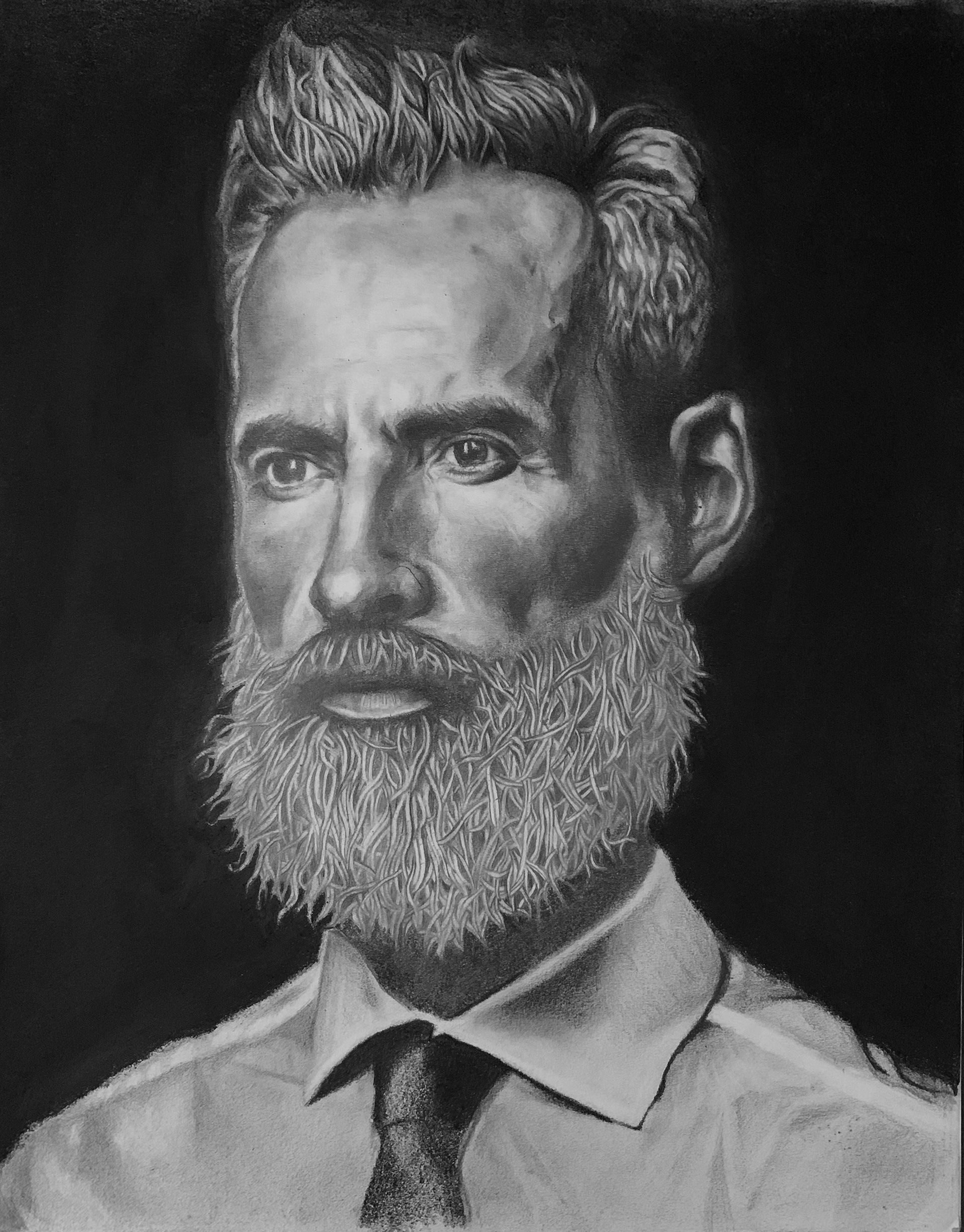 Male study and process of photograph by Joao Carlos (westcottu.com/in-studio-with-joao-carlos) Used: Graphite range HB-8B, Mechanical pencil, Charcoal sticks, Tombow eraser, Mars Lumograph Black pencil, photoshop for mask. Used brushes and blending stamps. Process: Focused primarily on proportions, rough sketched the face. Sculpted the face by using shadows and lighting. The strands of hair were a challenge. I settled for drawing small random strands of hair and added shading or highlighting them to emphasize or deemphasize.