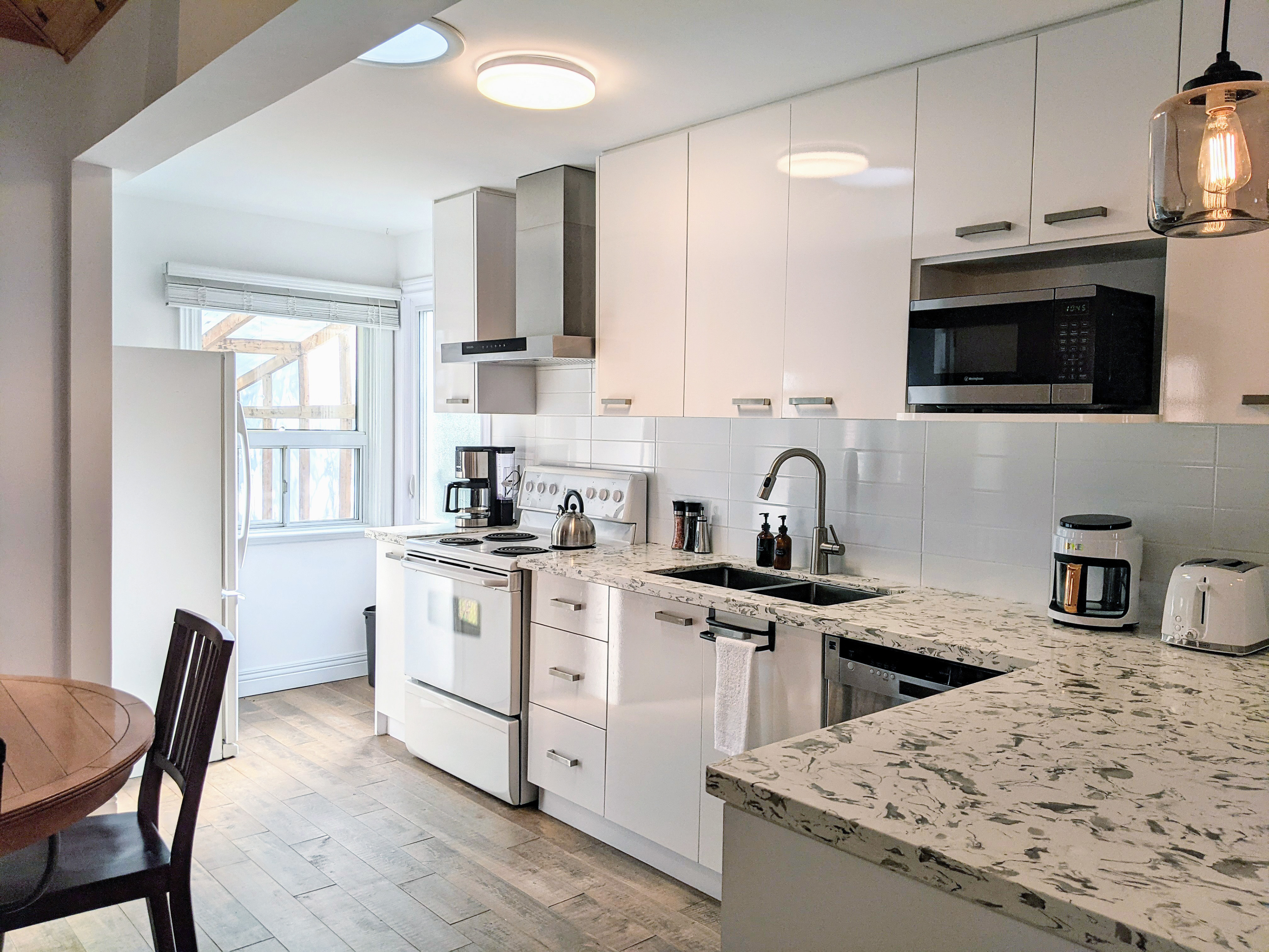 Kitchen with modern finishes at 53 Sixteenth Street, South Etobicoke