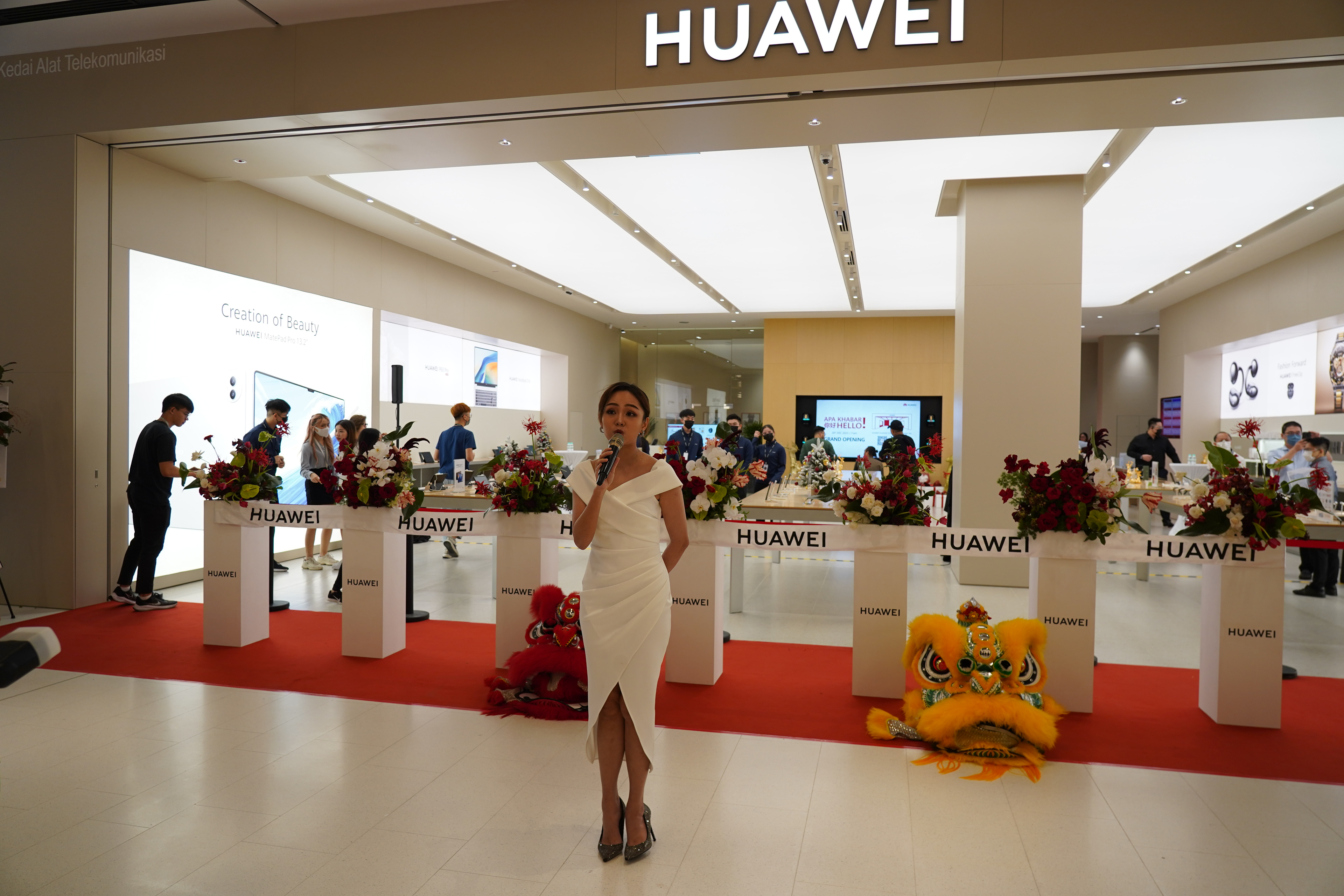Professional event host delivering a speech at a grand opening celebration