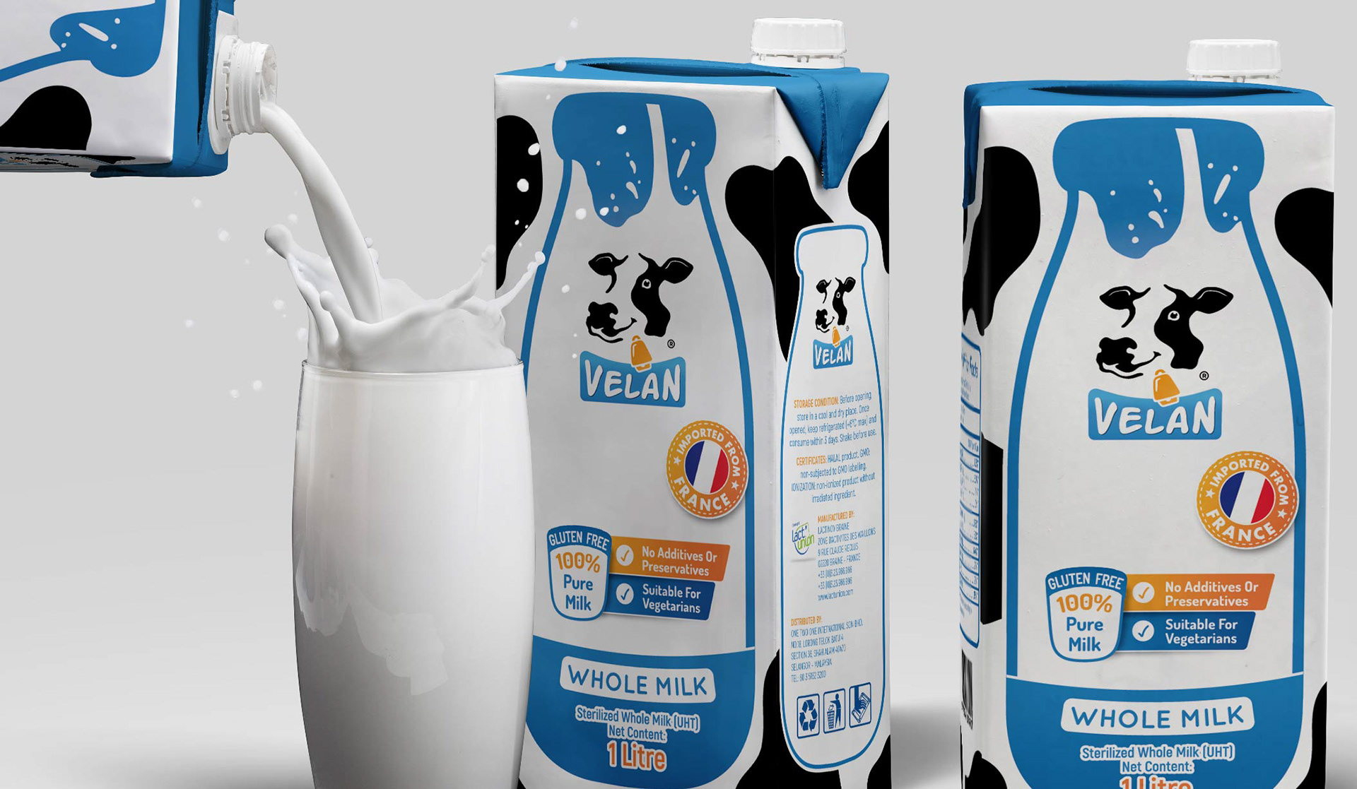 Two Tetrapak Milk boxes that have a Velan logo. Its visual design is composed of a milk jar, blue and black are the primary colors with a pinch of orange.