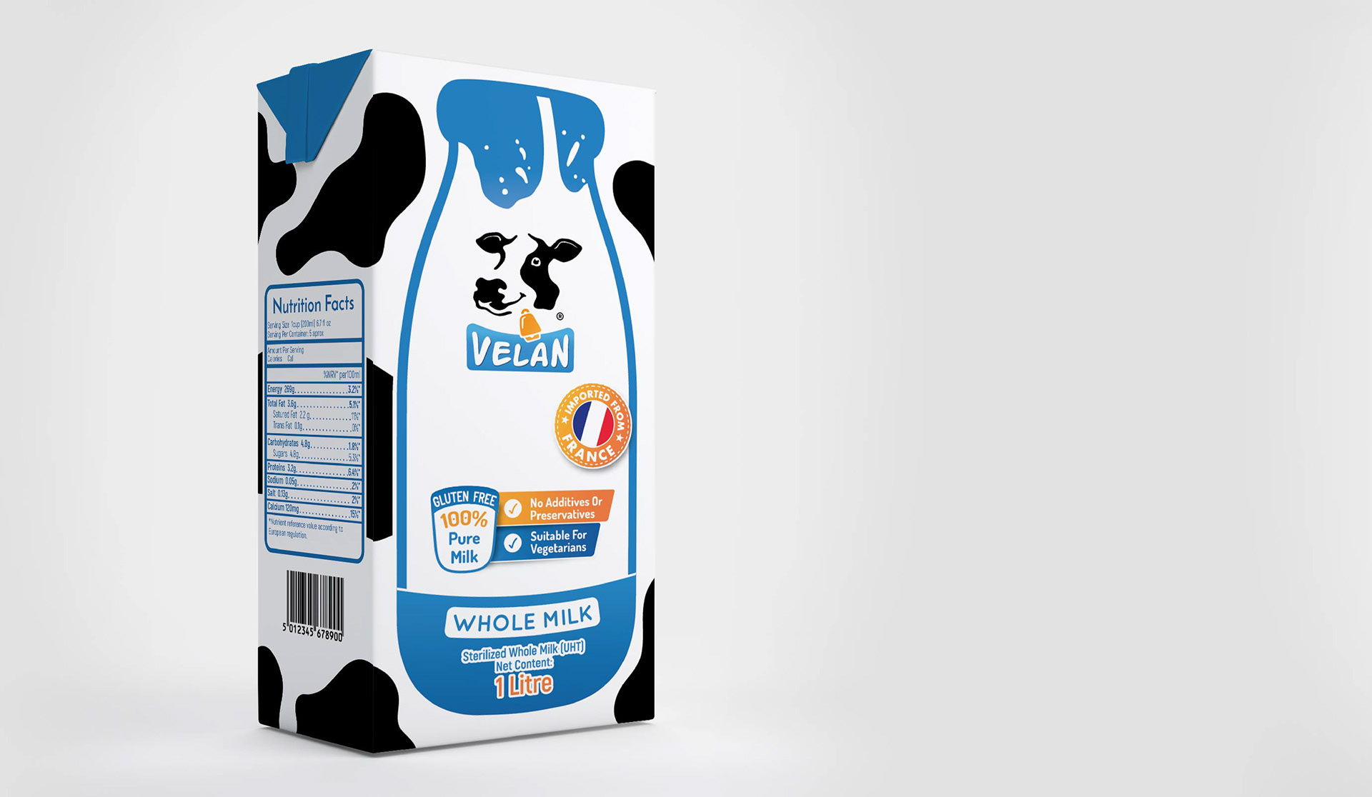 One Tetrapak Milk boxes that have a Velan logo. Its visual design is composed of a milk jar, blue and black are the primary colors with a pinch of orange.