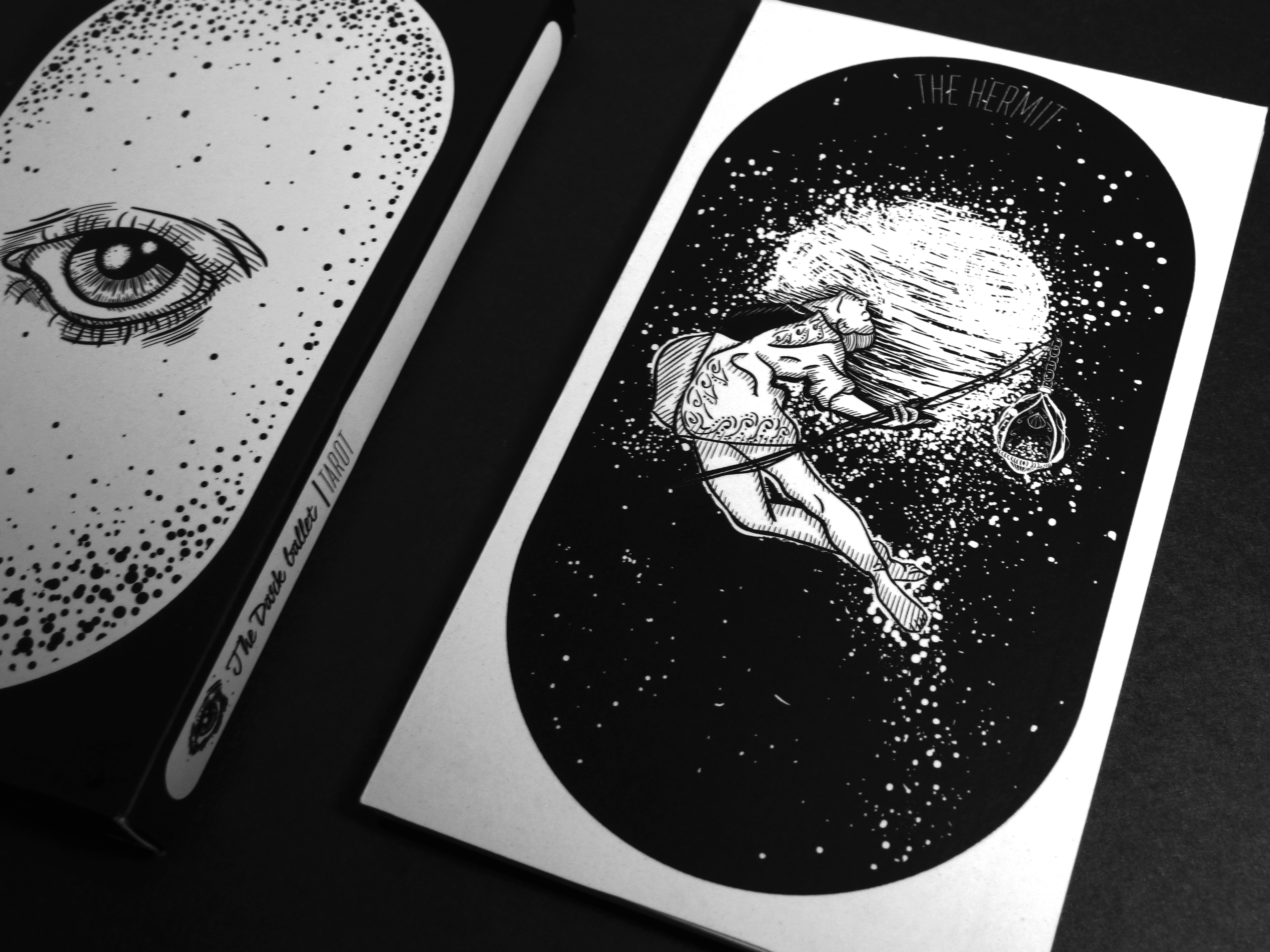 Cosmic Tarot with stars, galaxies and The Hermit illustration.