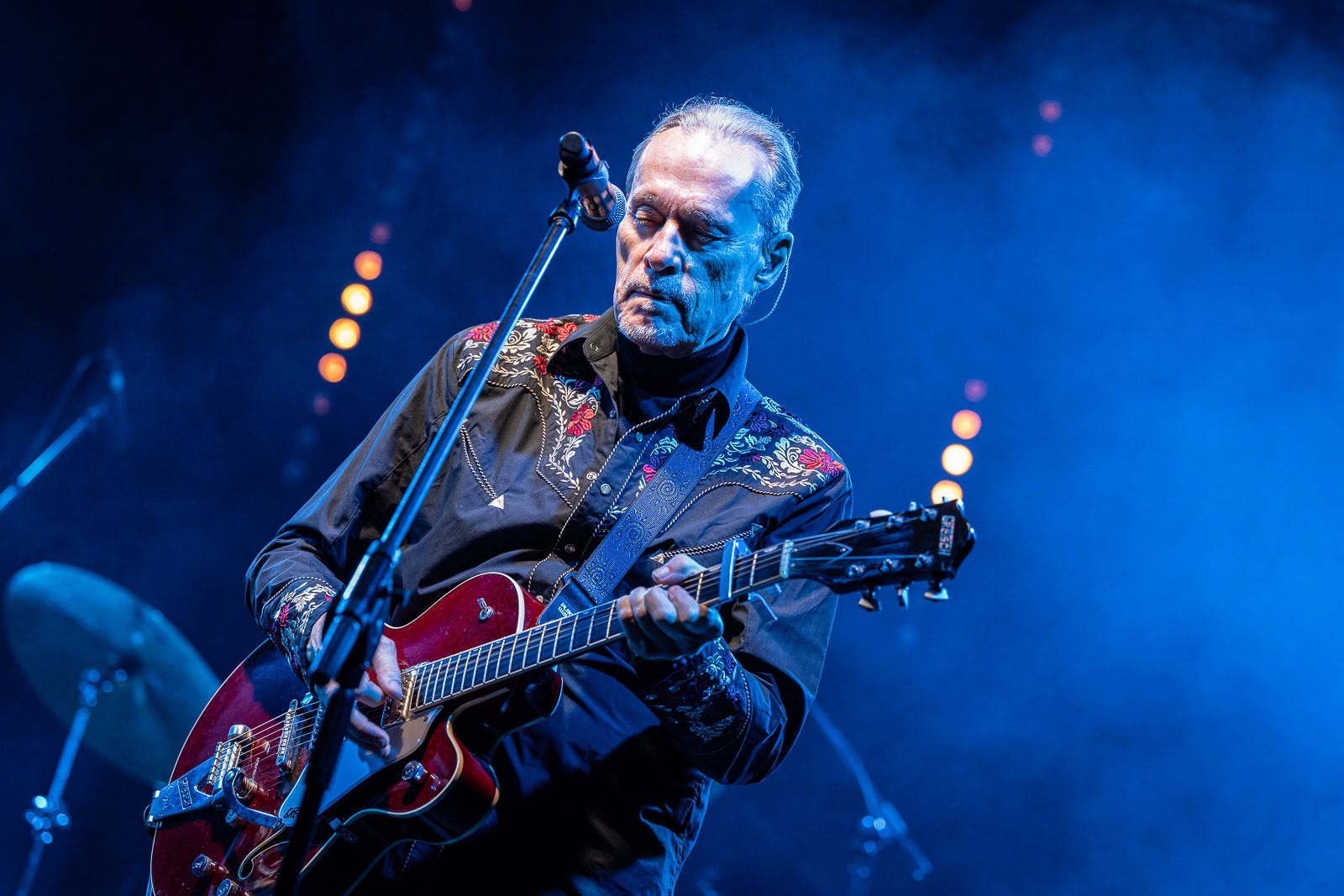 Fotografia koncertowa John Porter z gitarą