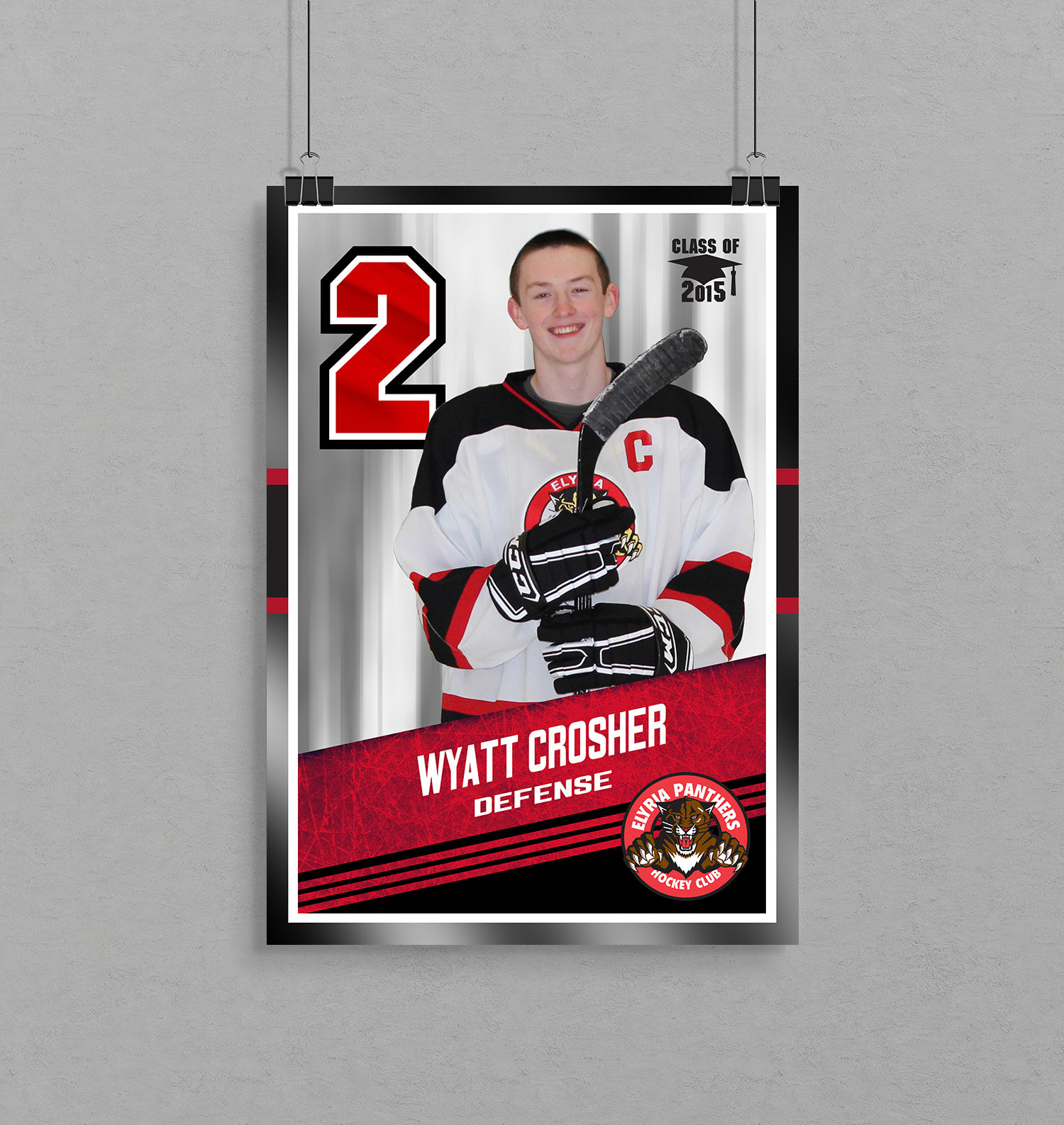 Elyria Senior Hockey poster hanging up with clips mockup