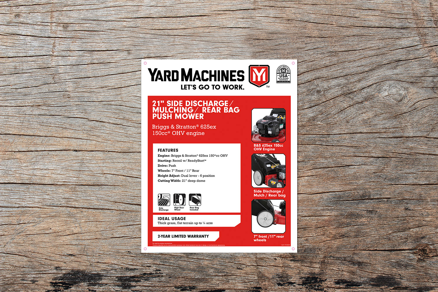 Yardmachines Mower on old wooden background