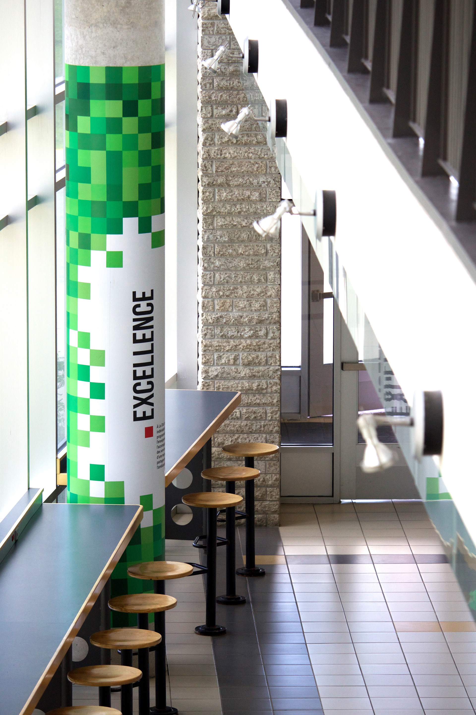 Excellence vinyl on a column.