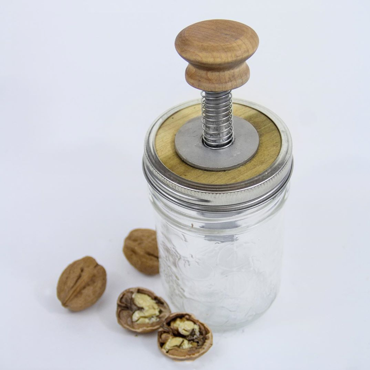 Walnut cracker and cracked walnut