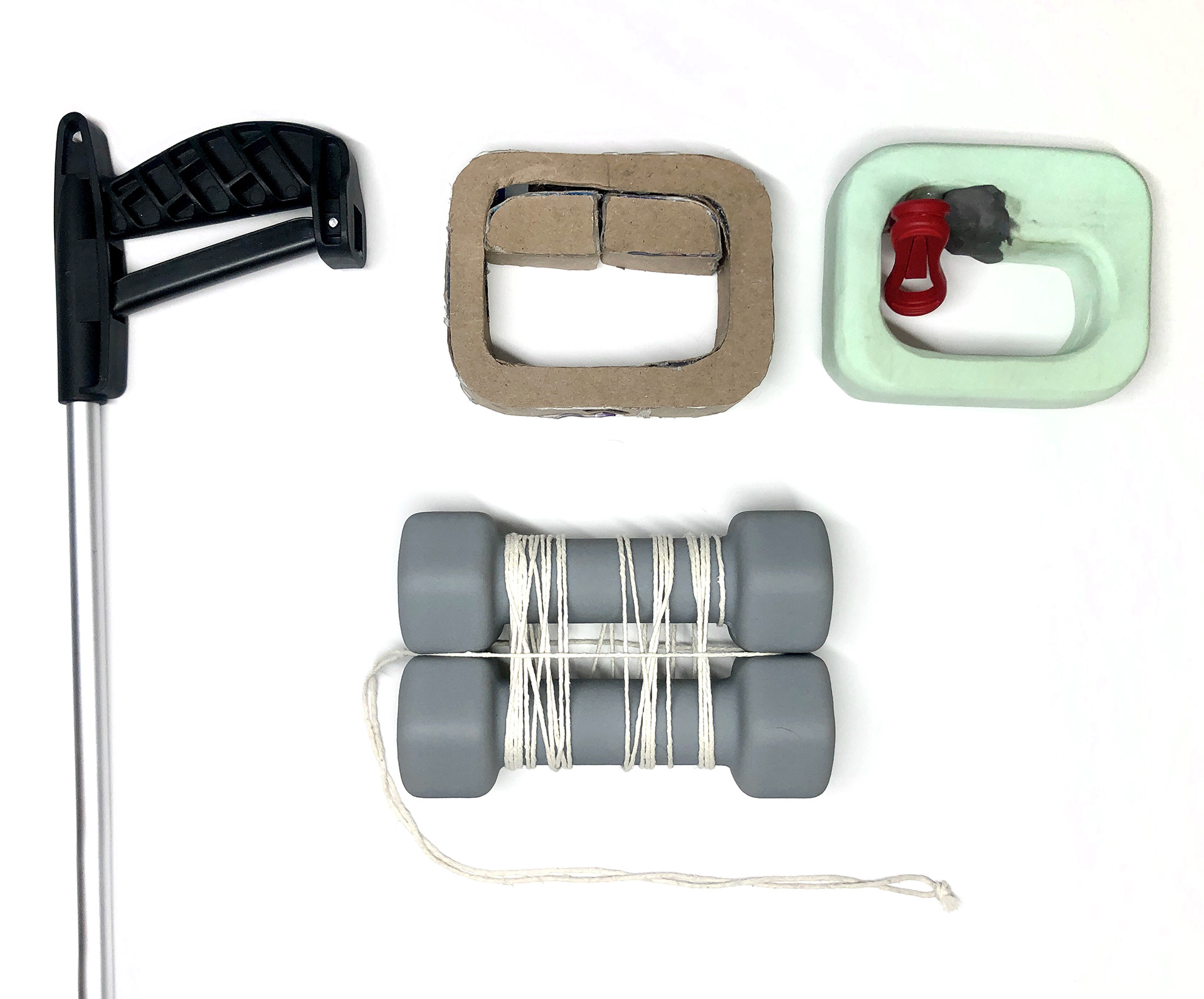 Early prototypes explored handle form and button placement.