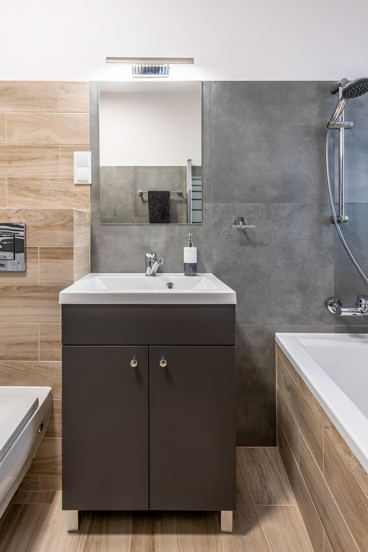 Fotomotiva Kawalerka w Poznaniu łazienka szafka umywalka