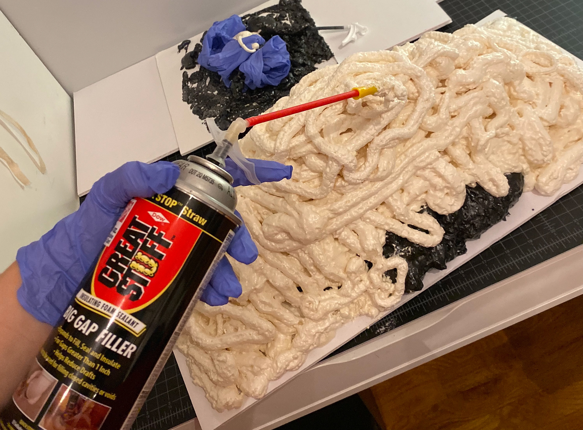Using expanding foam, build a mound
