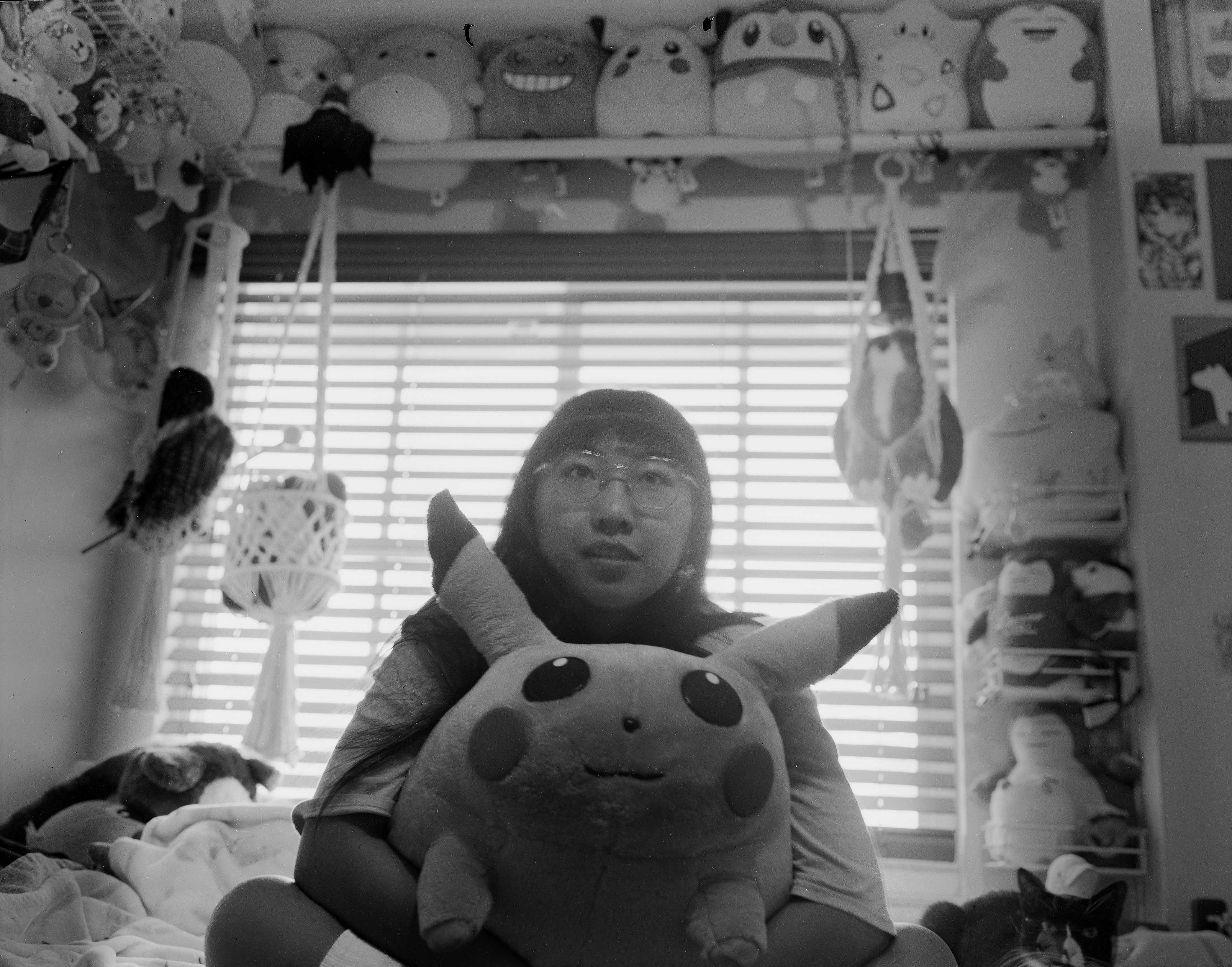 Vivonda Le Nghiem - Her family has had this big Pikachu plush from before she was born and she inherited it. It has survived surgeries as a means of maintenance performed by her mother to prevent mold from growing inside the stuffing. It is something she holds onto that matchesher love and joy of Pokemon.