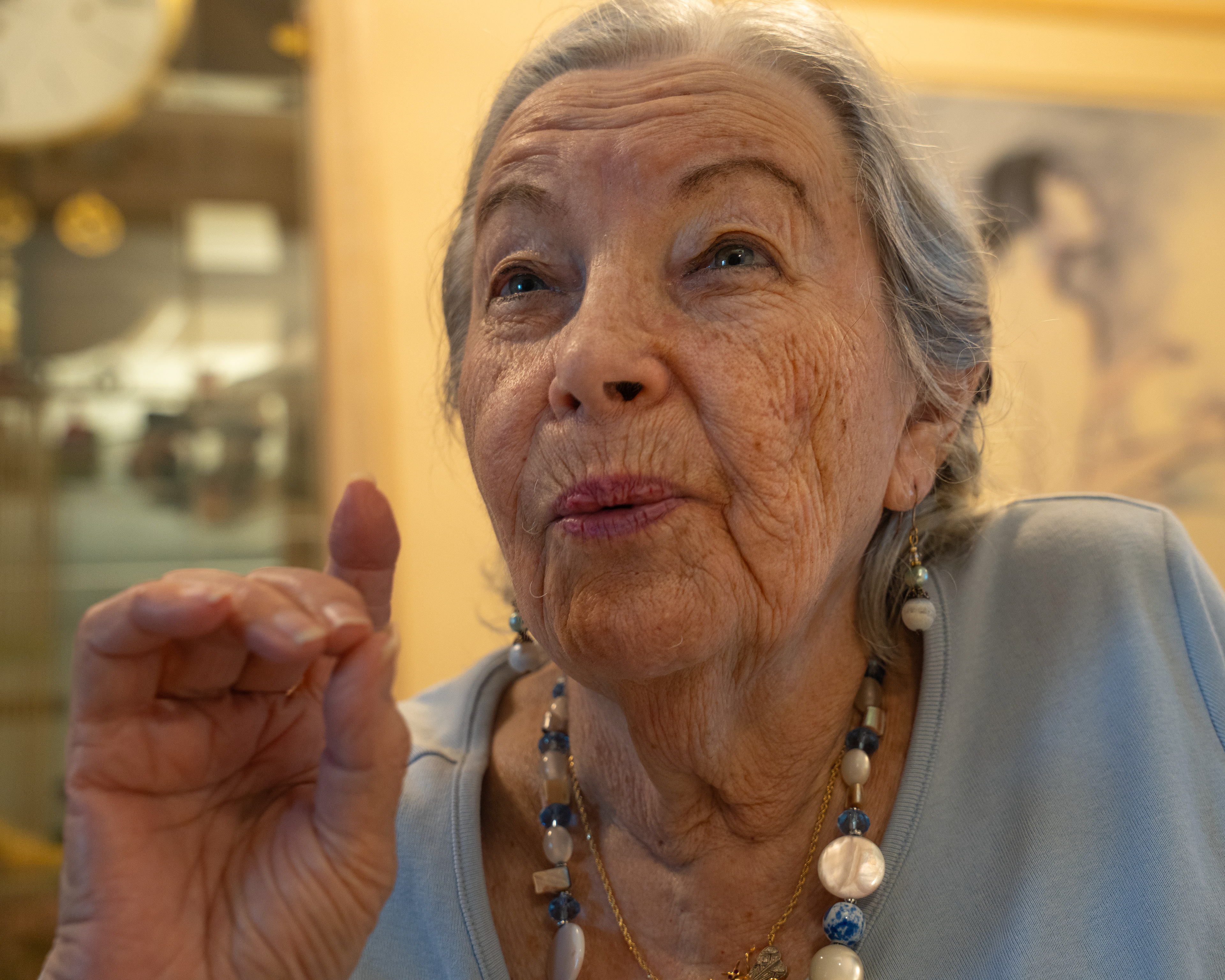 Mimi Poliner - The necklace here is a necklace that her father gave her when she was in Brazil, from when her family was escaping persecution in the 1940s. Despite this materail response, what she cherishes most are the stories that she holds onto and speaks of more than anything physical.