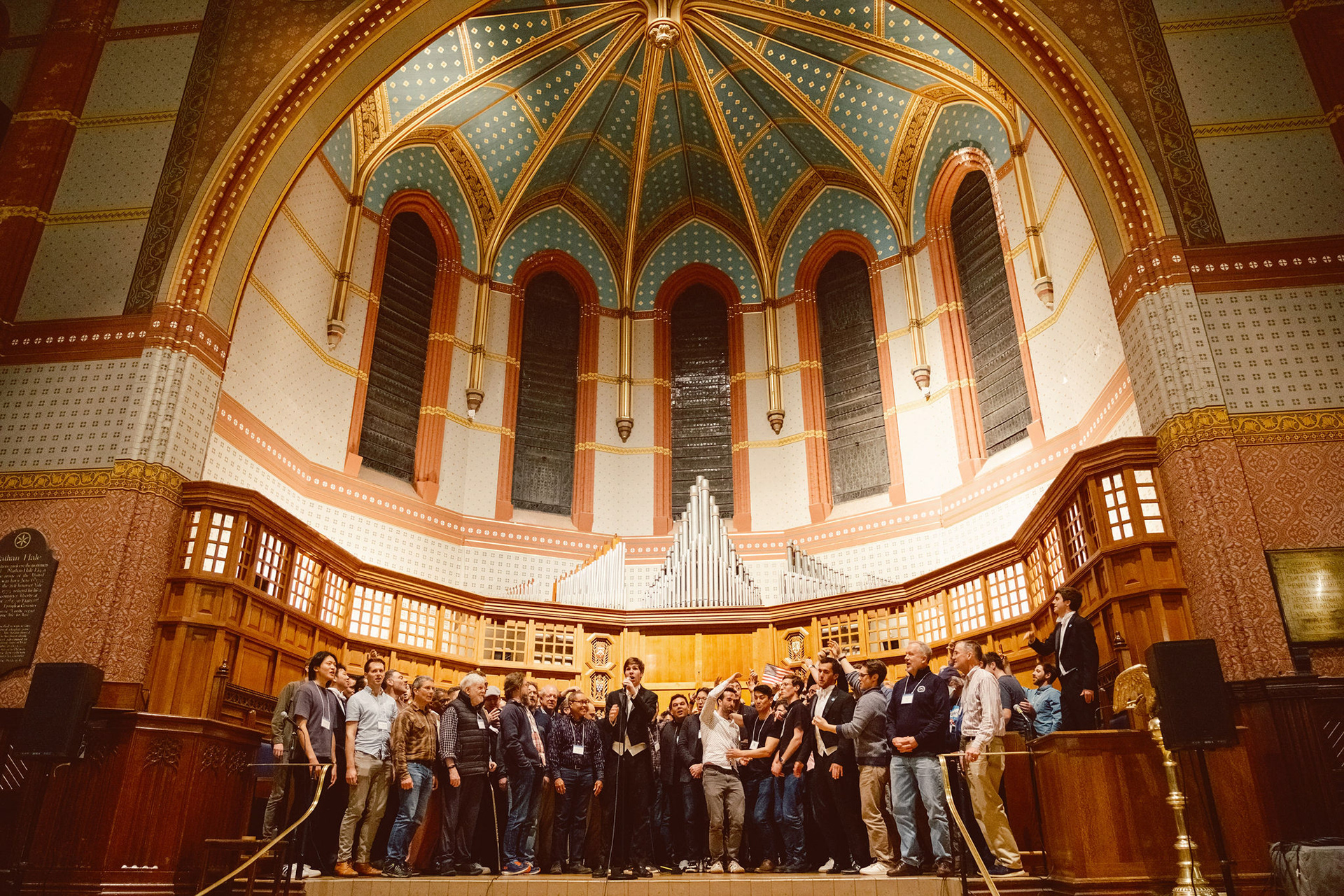 A cappella group performance at Yale Spizzwinks reunion event