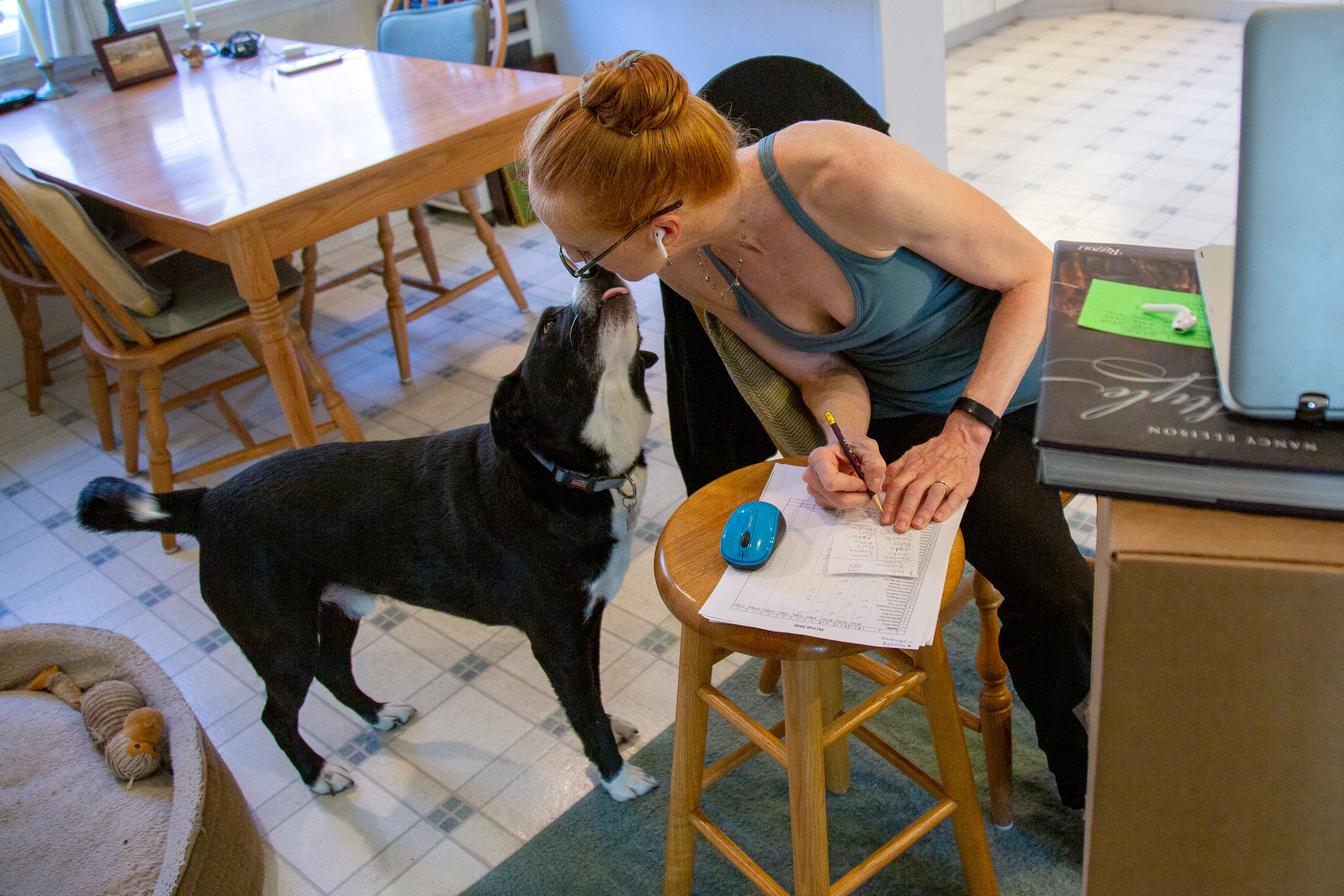 Tovar gives her studio mate a little attention prior to class.