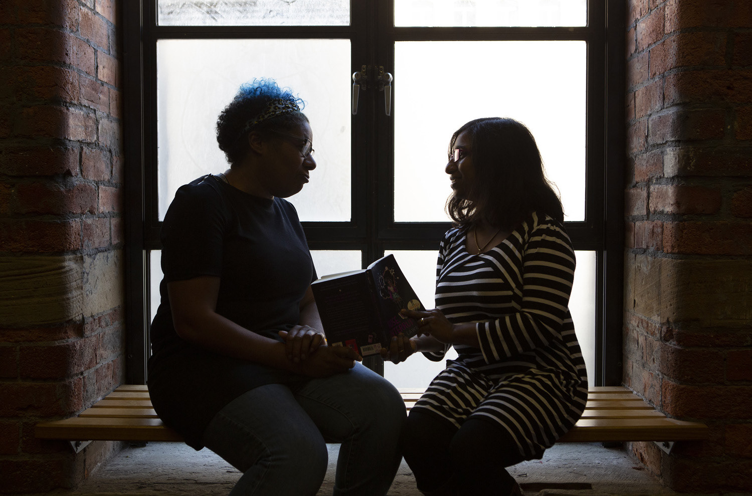 Award-winning author Patrice Lawrence (pictured with Rhoda Baxter) hosts a BookTrust Represents workshop, one of a number of free training sessions designed to help promote and develop children's authors and illustrators of colour, at the Mind The Gap Theatre in Bradford. PRESS ASSOCIATION Photo. Issue date: Sunday September 22, 2019. The workshops are led by award-winning authors and industry experts. Lucy Ray/PA Wire