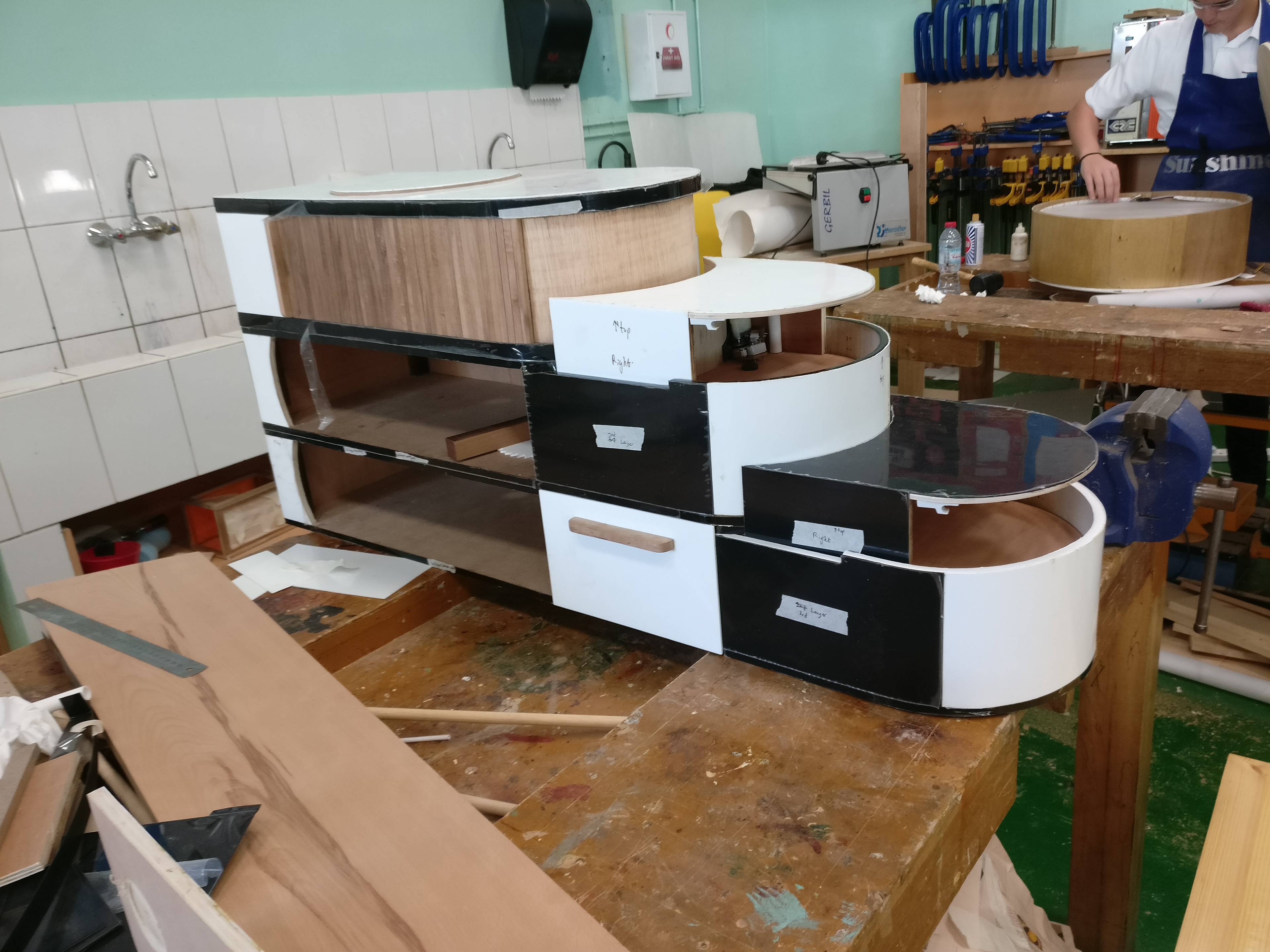 The wood was finished by laminating the surface with HIPS sheets