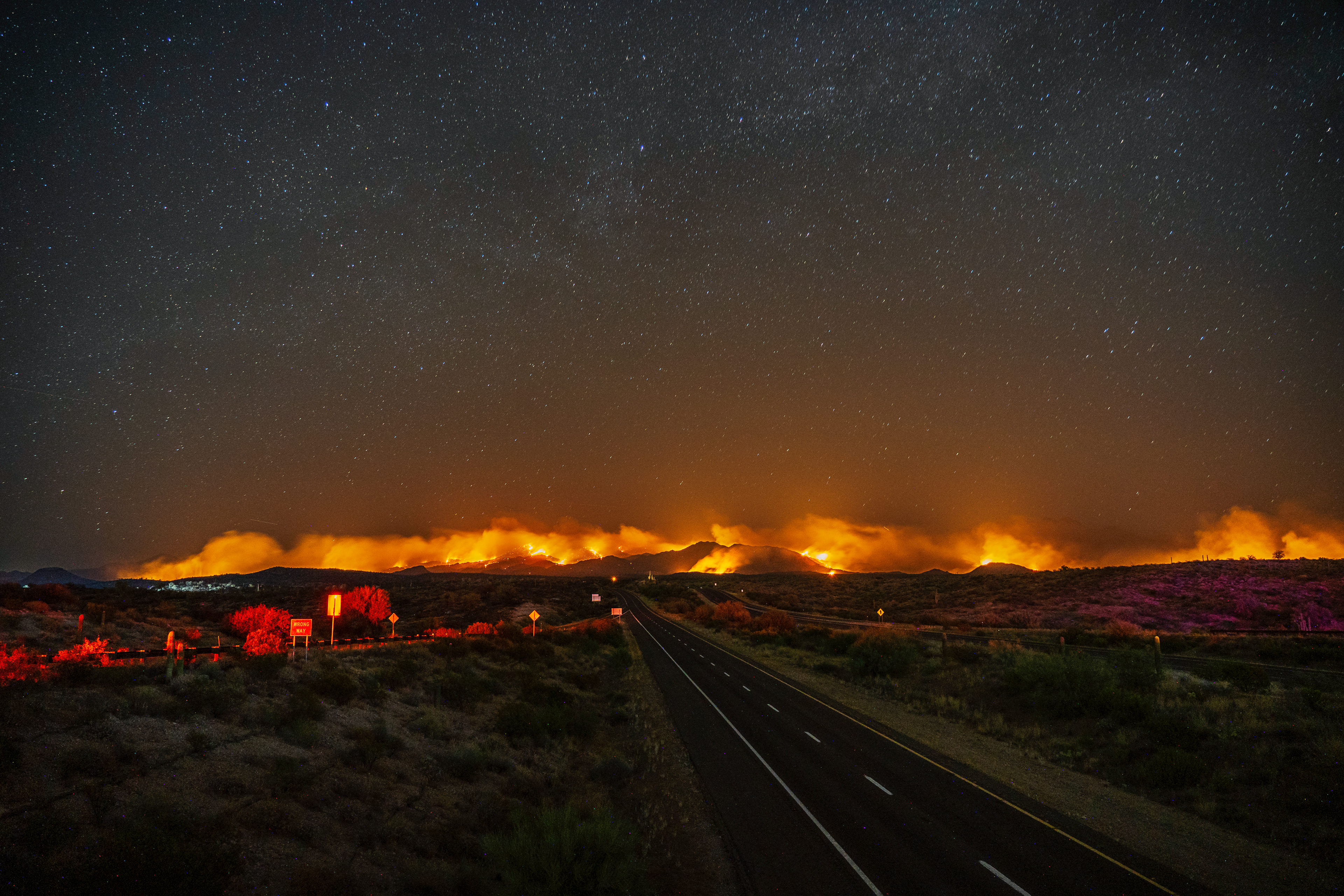 Officials close Bush Highway as the Bush Fire burns through the Tonto Forest in Arizona on June 14, 2020. (Photo by Samantha Chow)