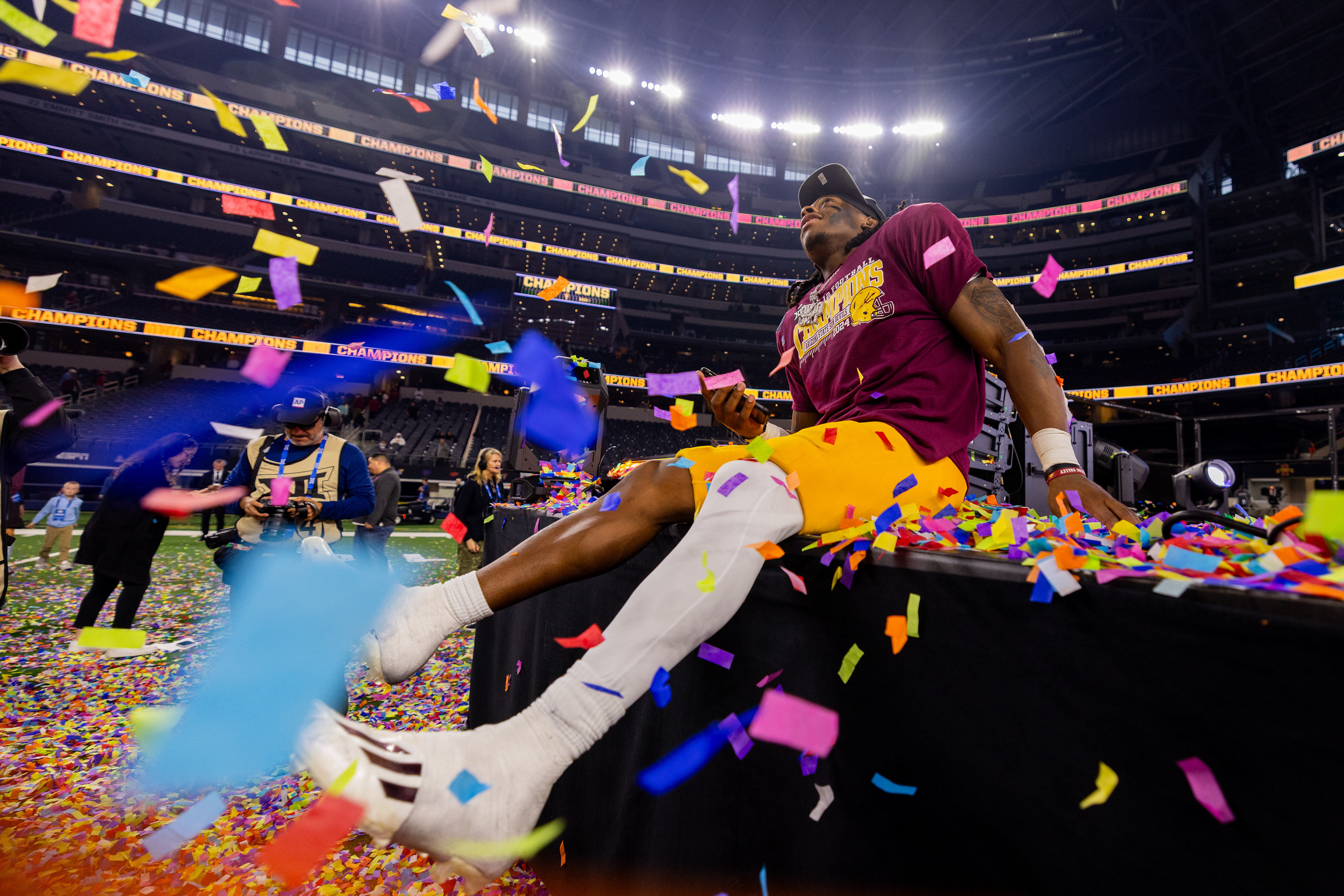 ASU football celebrates after winning the Dr Pepper Big 12 Football Championship game against Iowa State at AT&T Stadium in Arlington, Texas, on Dec. 7, 2024. (Photo by Samantha Chow/Arizona State University)