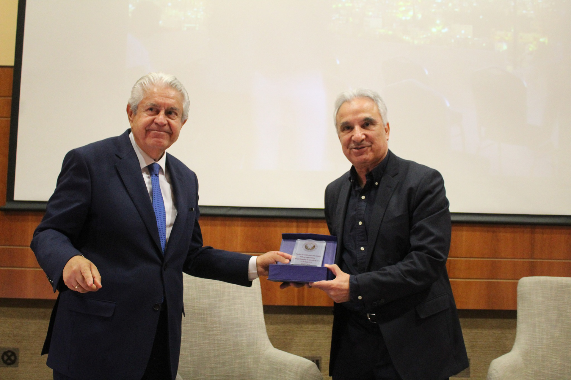 Prof. Kamel Mahadin honoring Dr. Farouk Yaghmour