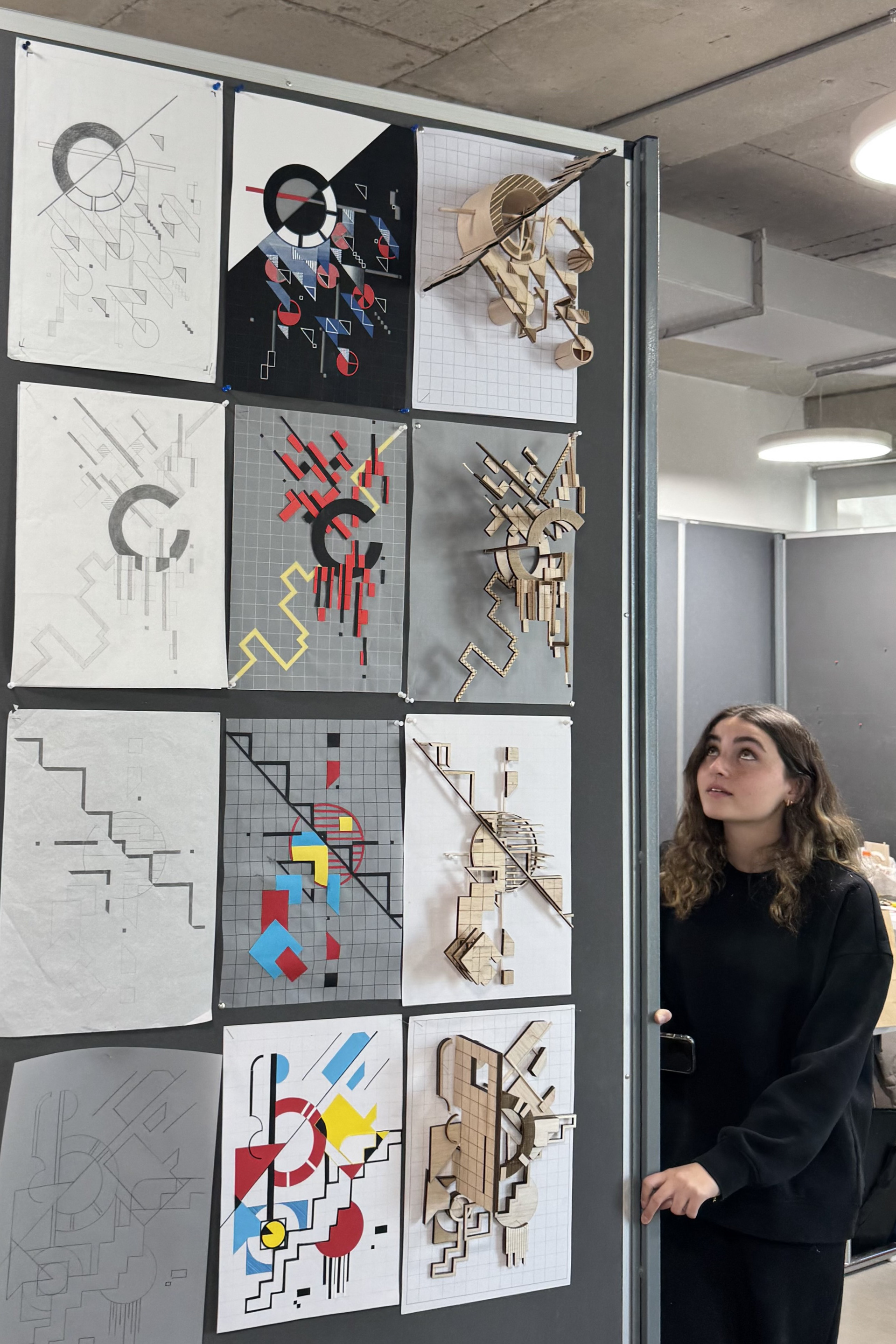 DANIA keeping an eye on her model while moving the partition.