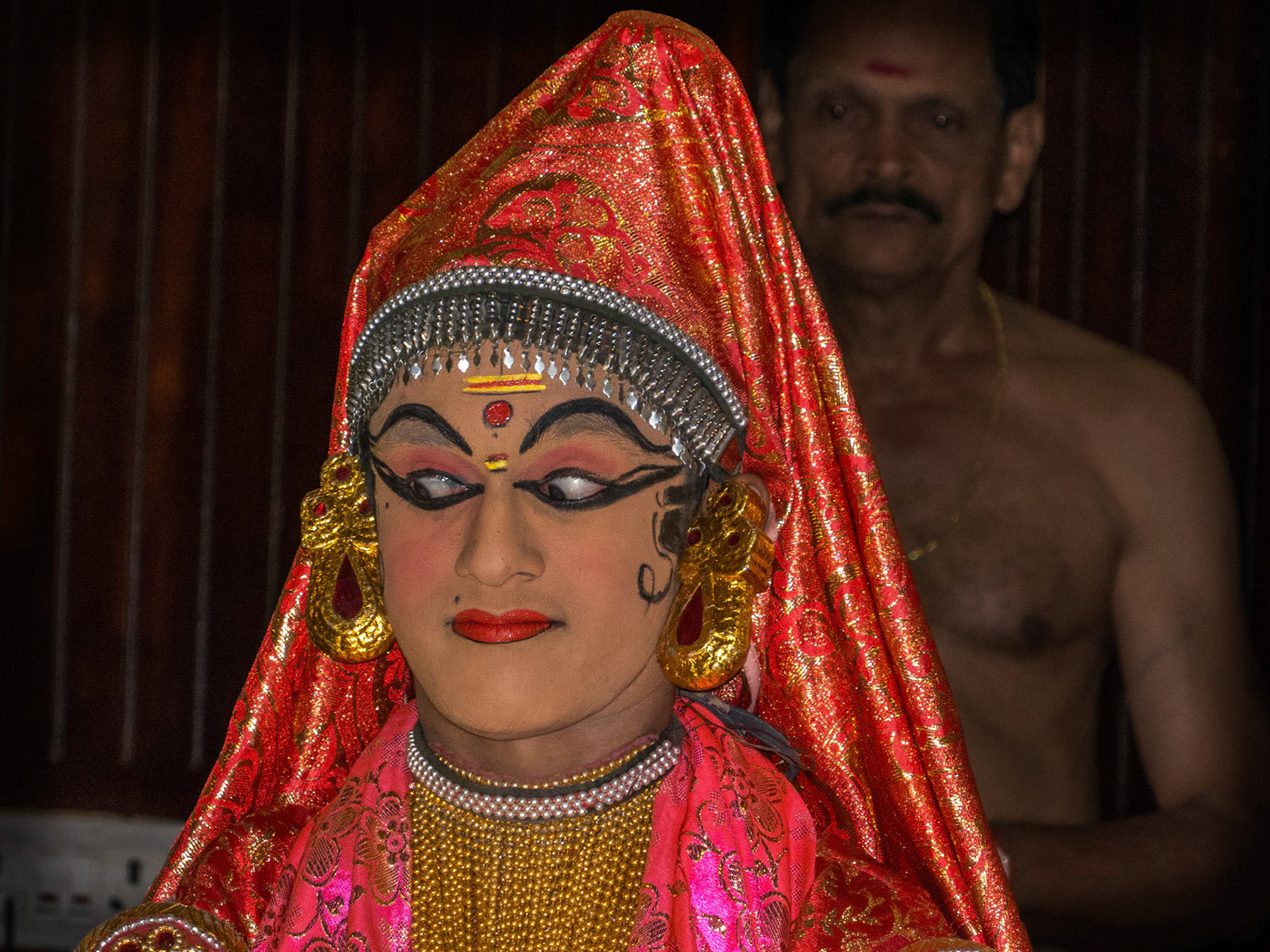 Demonstrating the prescribed eye movements/positions used in the genre (there are over 20!).