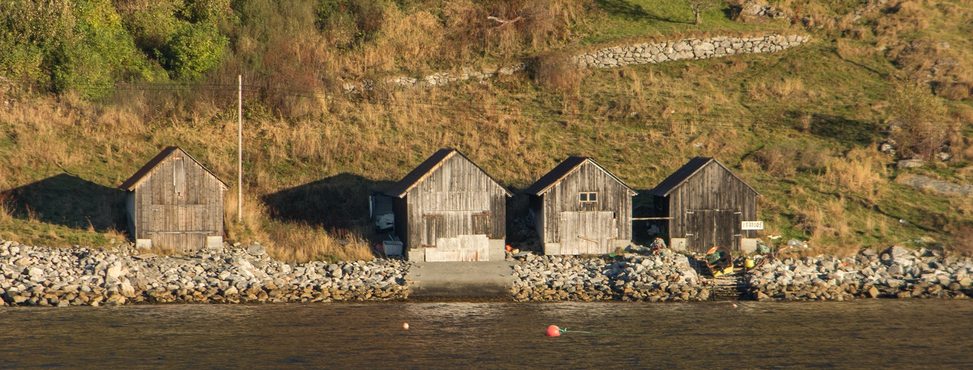 Boathouses alongside Norangsfjorder