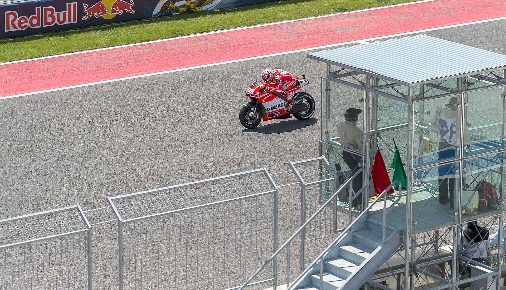Nicky Hayden flies down the front straight on his Ducati during the Grand Prix of the America