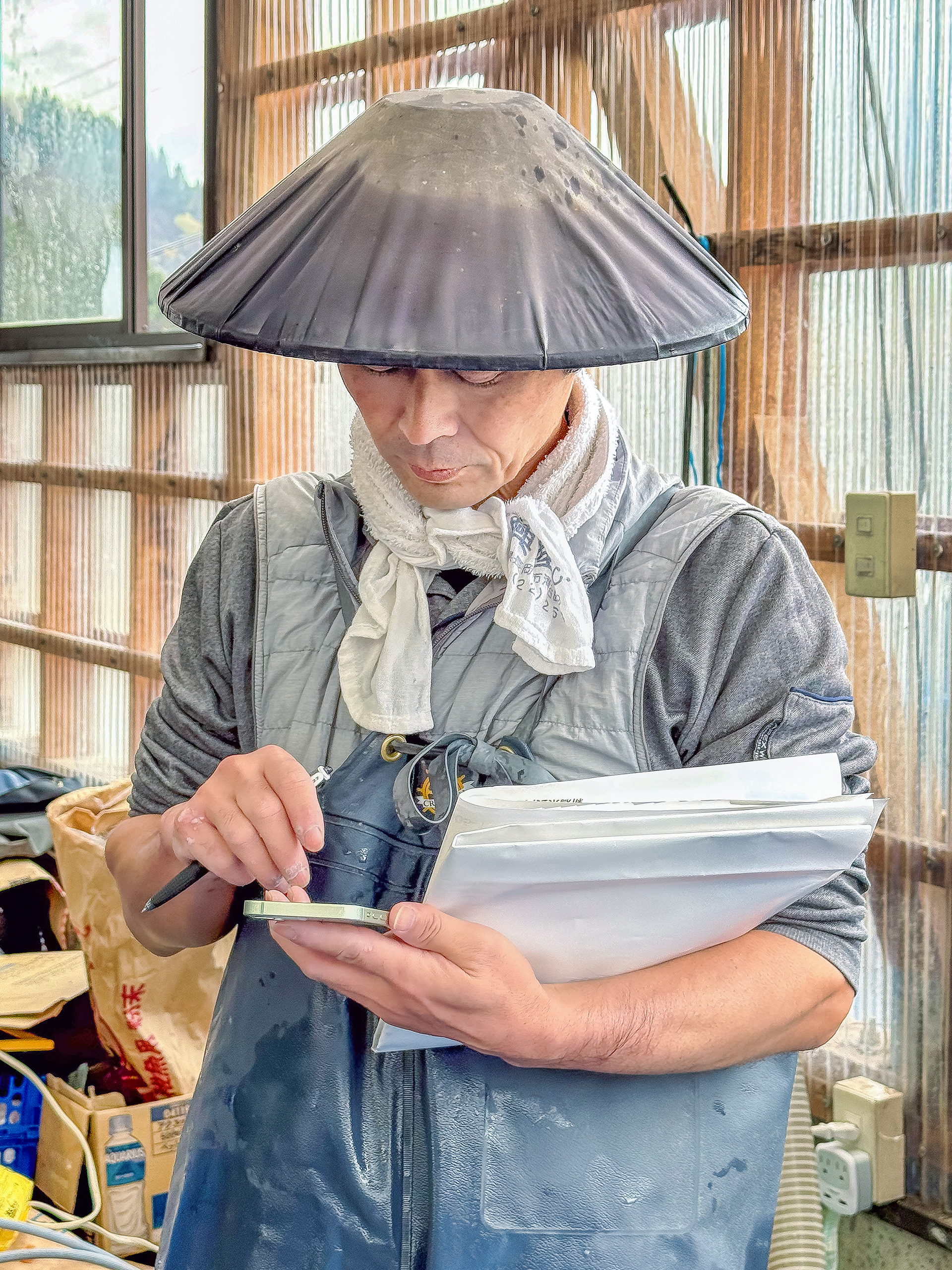 Fukusawa does the business of a Koi Auction